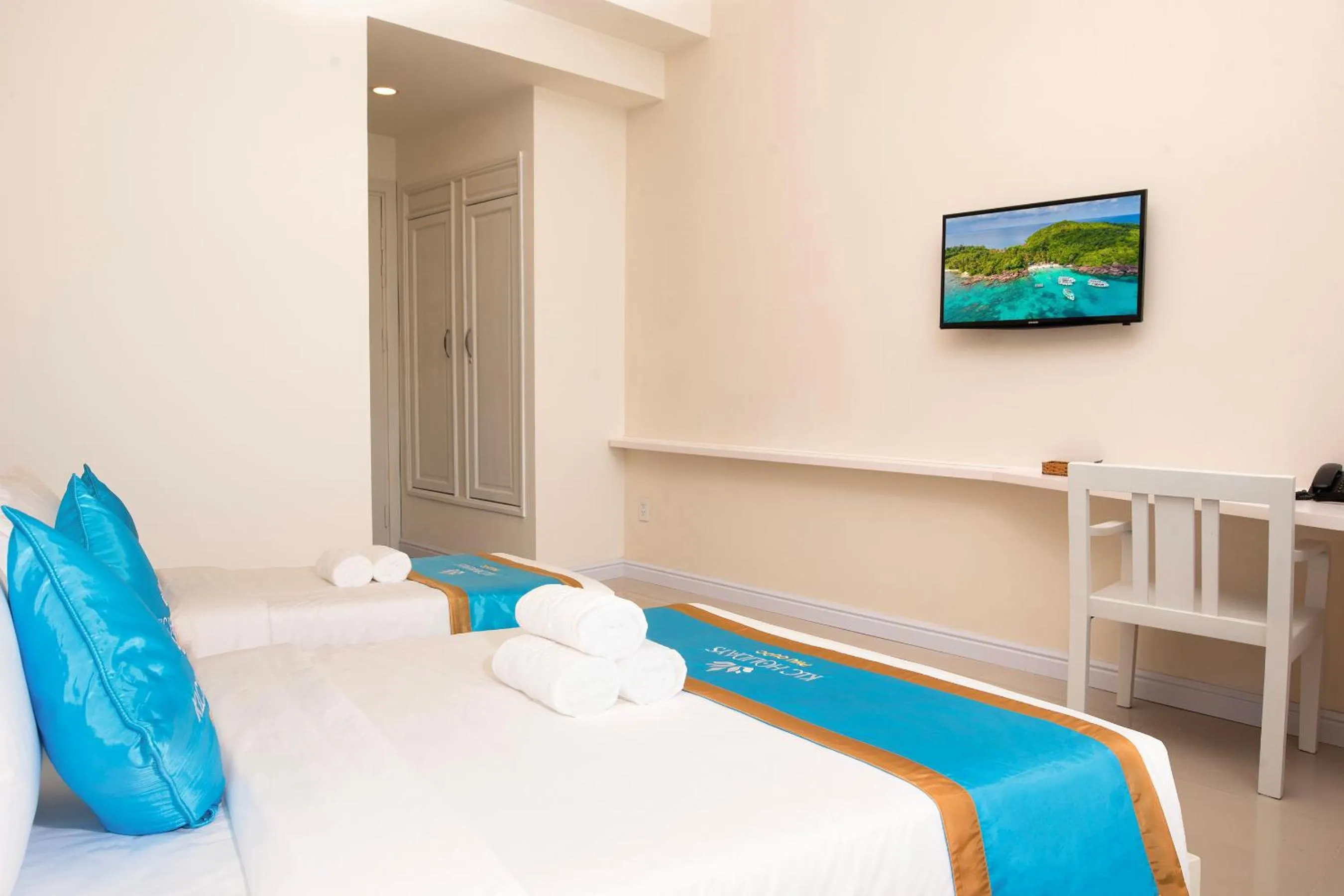 Bed in KLC Holidays Phu Quoc Hotel