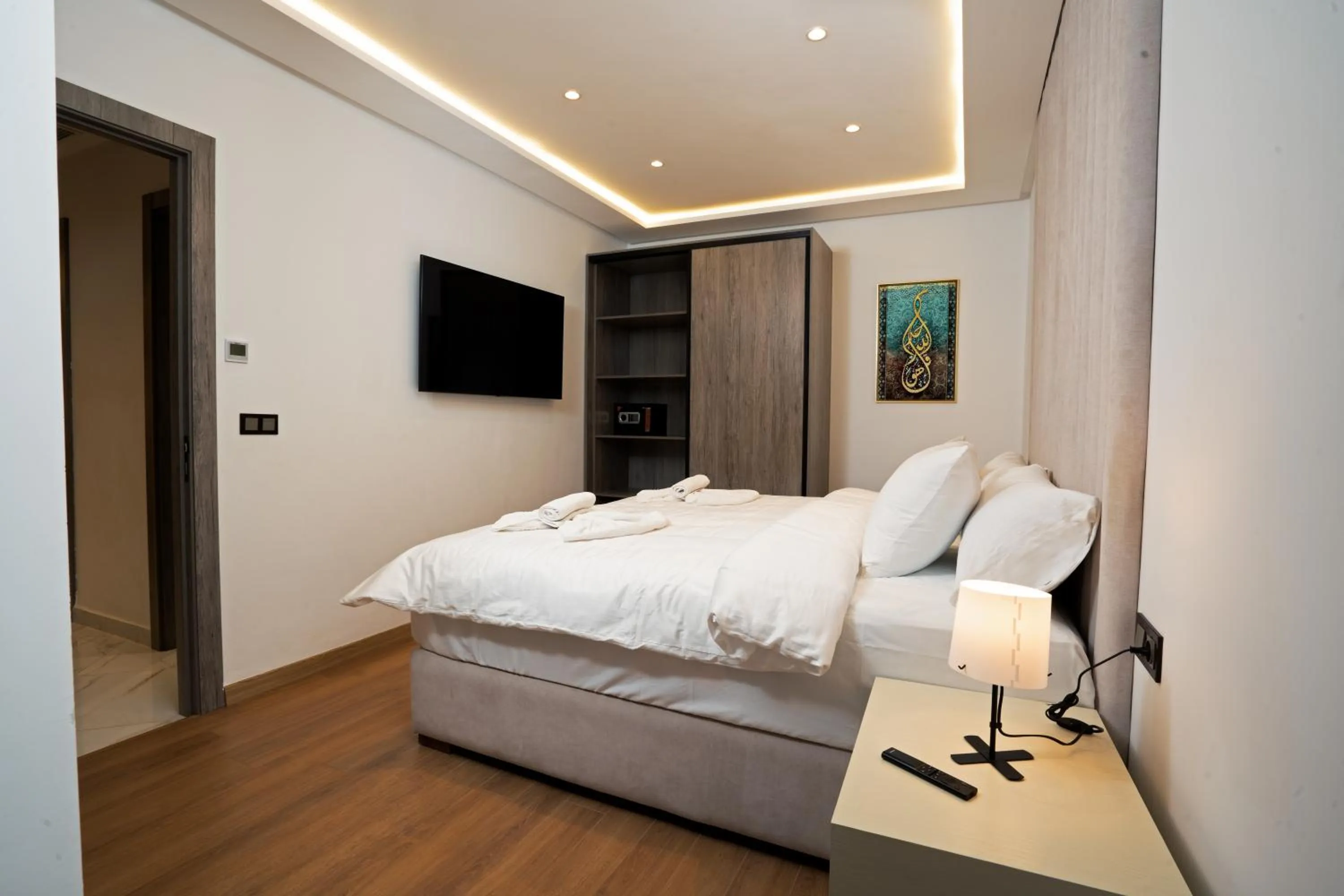 Bed in Amelia Appart-Hotel