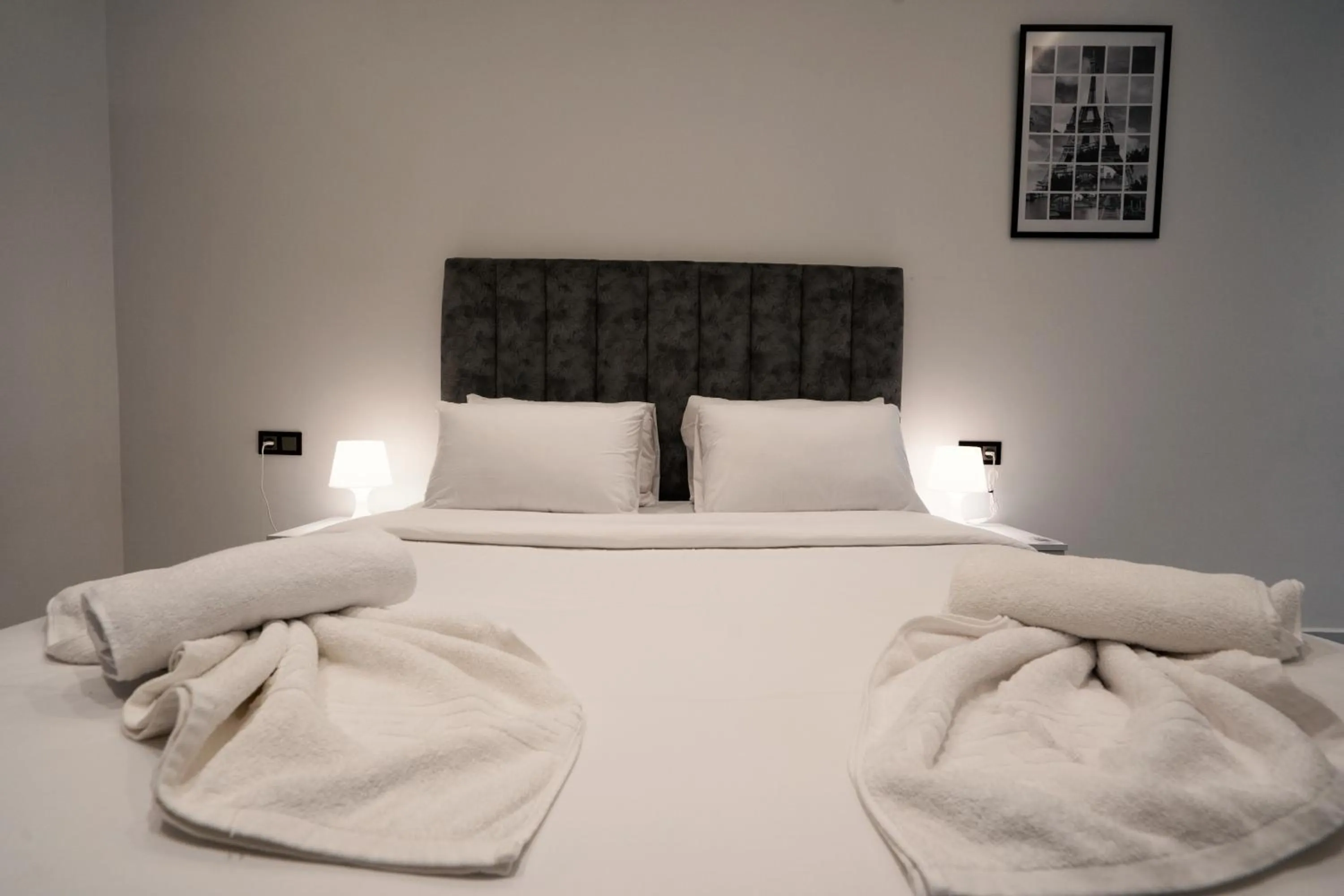 Bed in Amelia Appart-Hotel