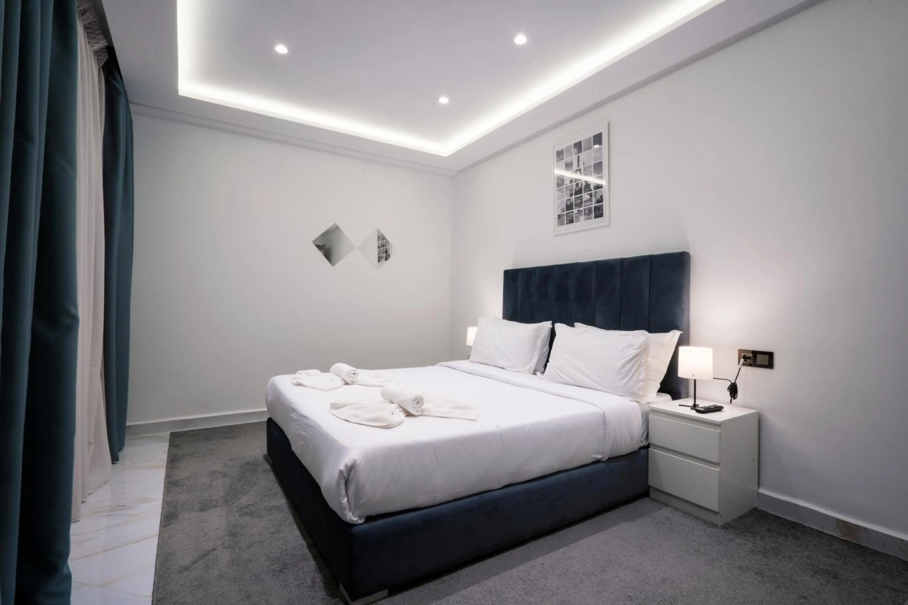 Bed in Amelia Appart-Hotel