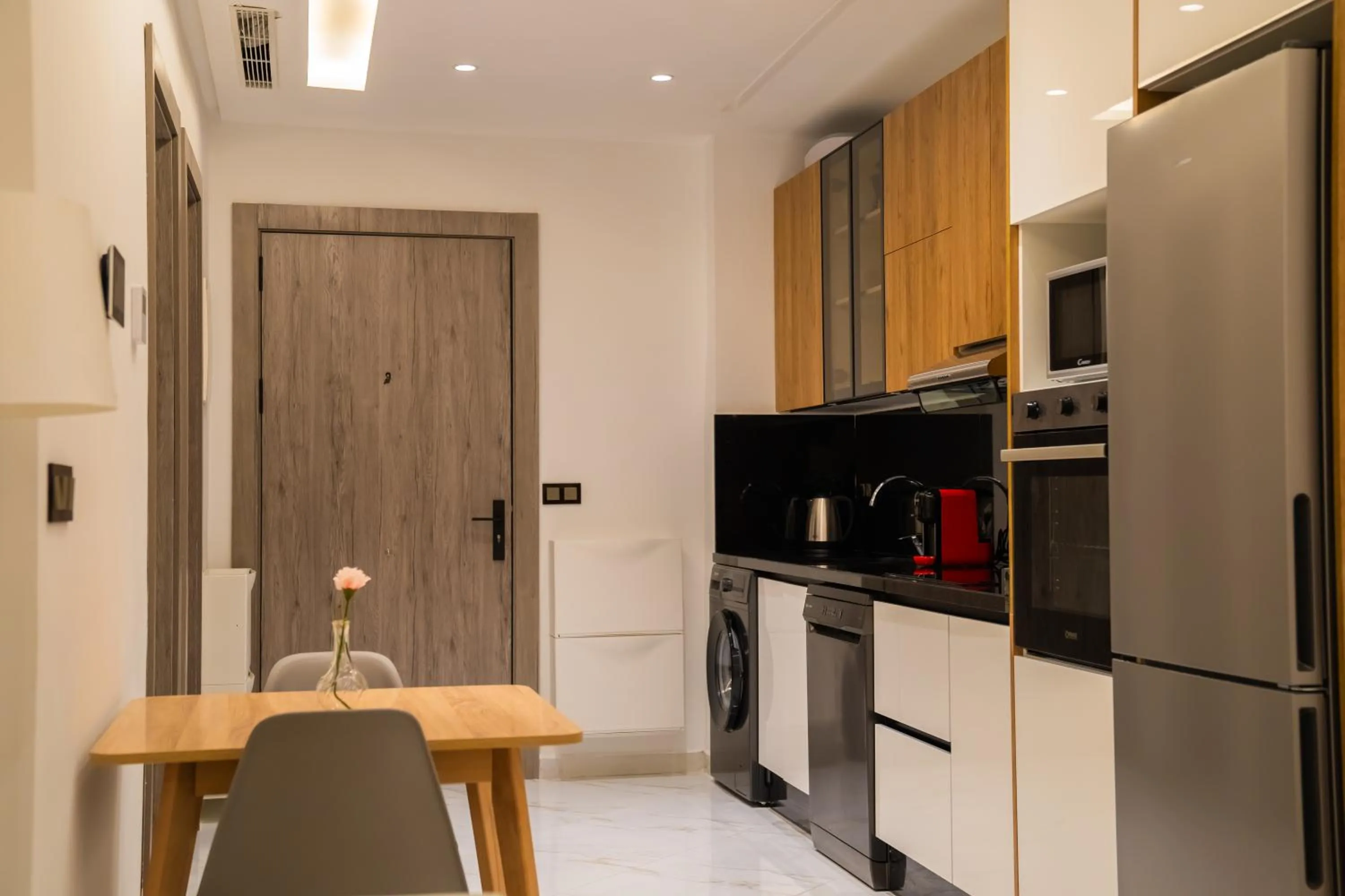 Kitchen or kitchenette in Amelia Appart-Hotel