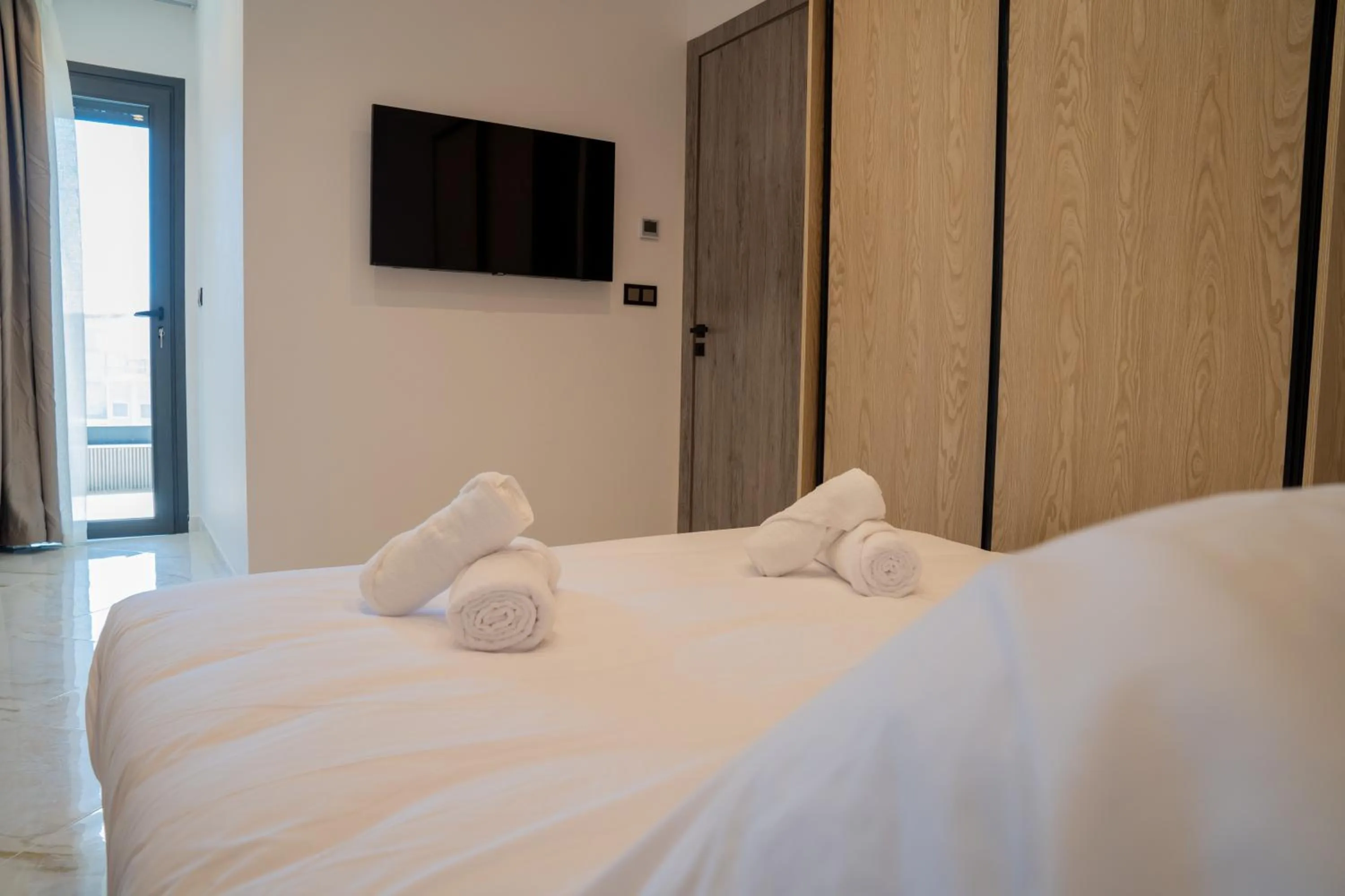 Bed in Living Appart-Hotel