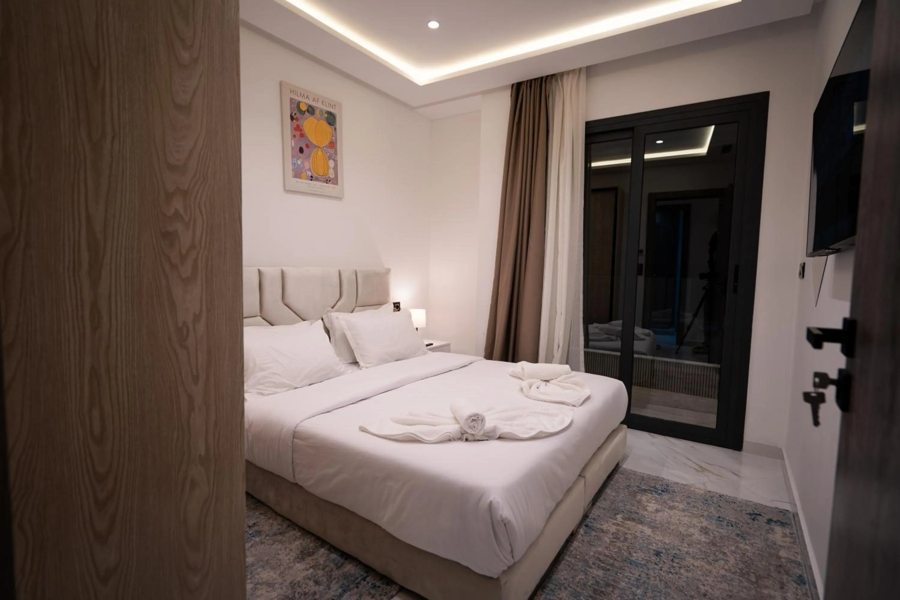 Bed in Living Appart-Hotel