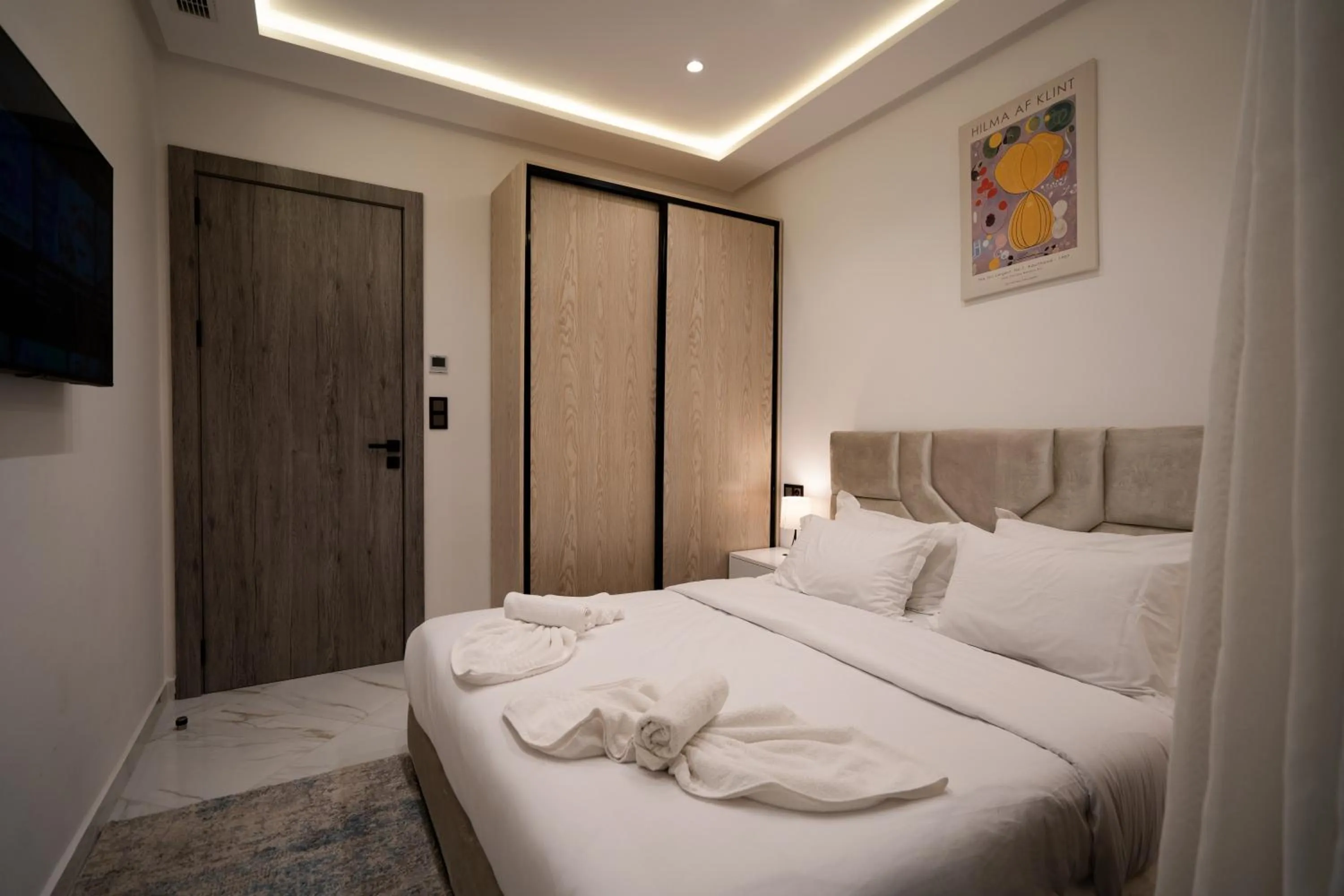 Bed in Living Appart-Hotel