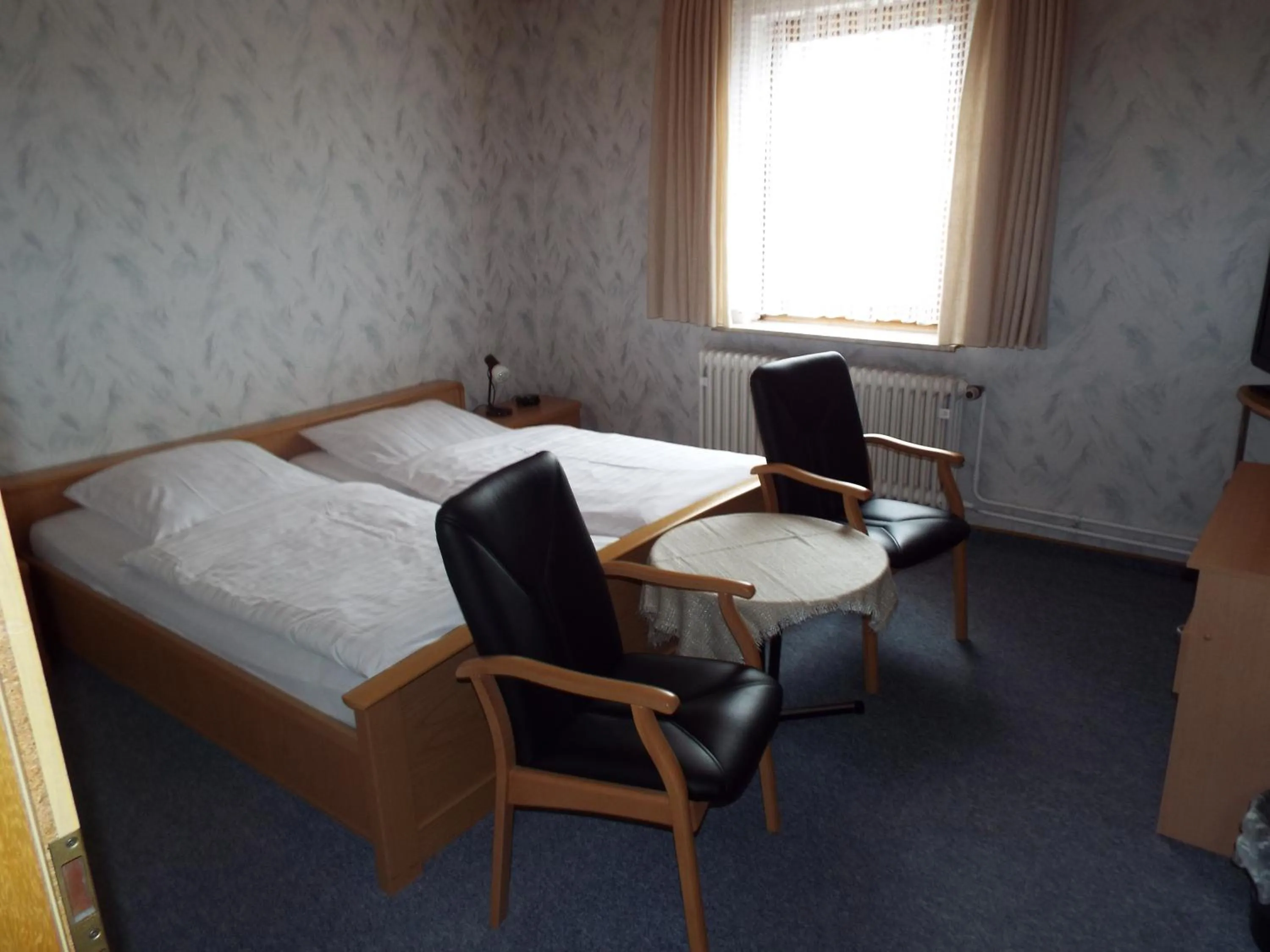 Photo of the whole room, Bed in Hotel garni Zum Reinhardswald