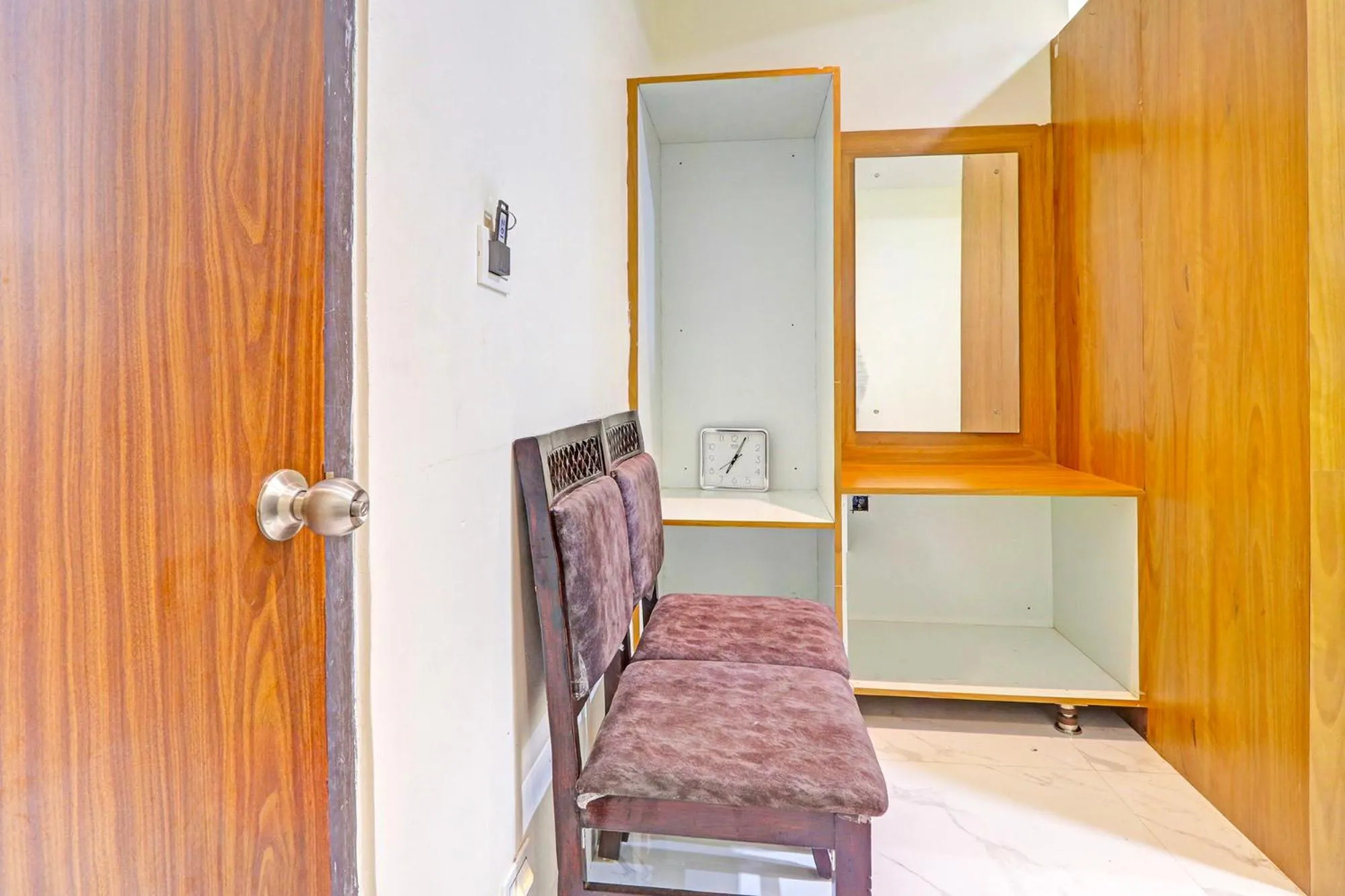 Bedroom in FabHotel Dharani Grand - Nr Mamata Medical College