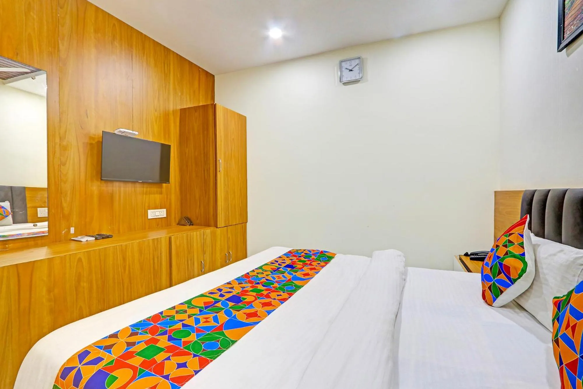 Bed in FabHotel Dharani Grand - Nr Mamata Medical College