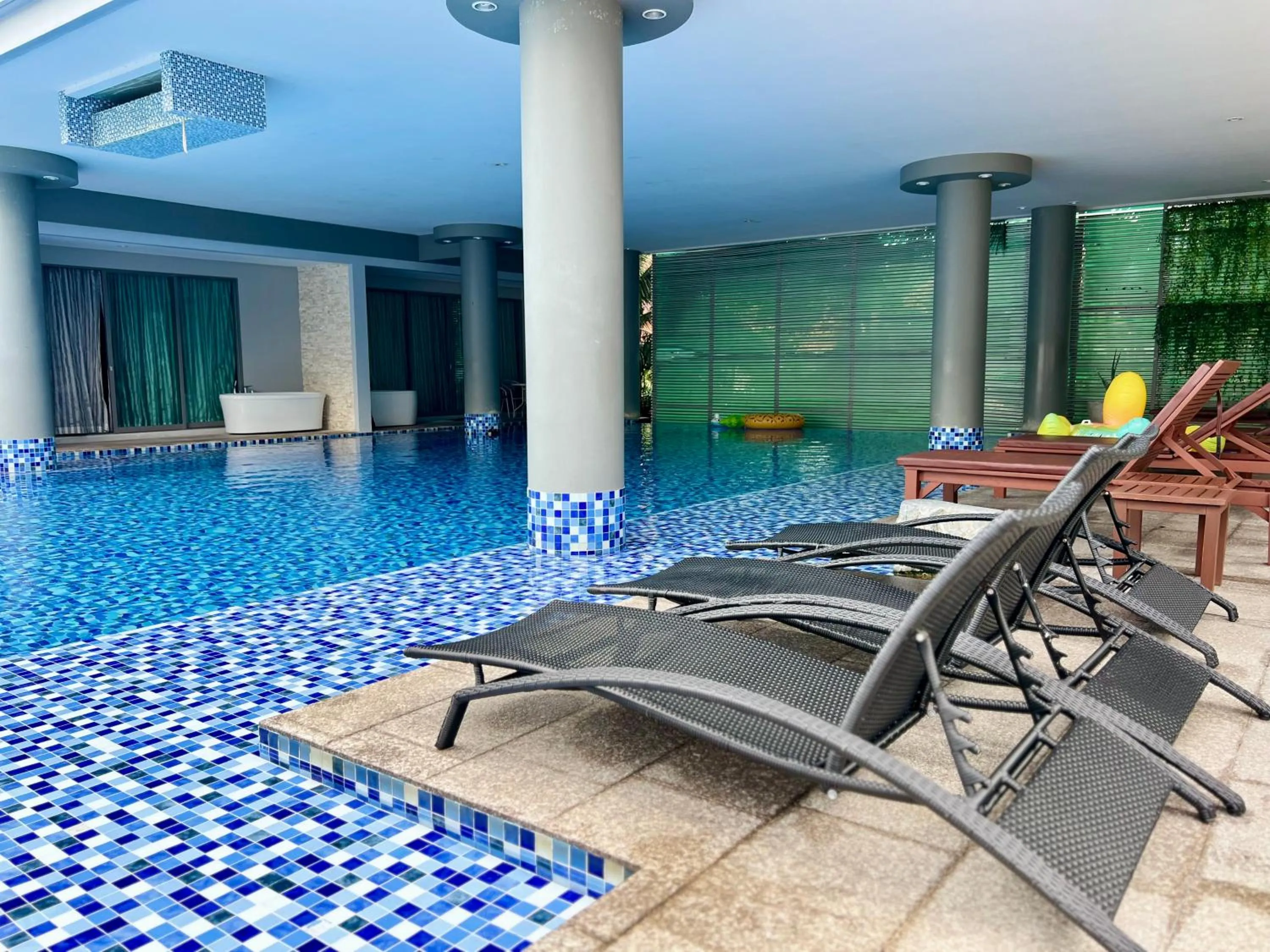 Swimming pool in The Regent Bangtao by RESAVA