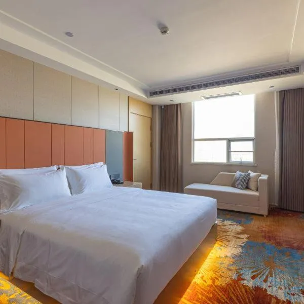 Bed in Ramada Plaza by Wyndham Ezhou Binjiang