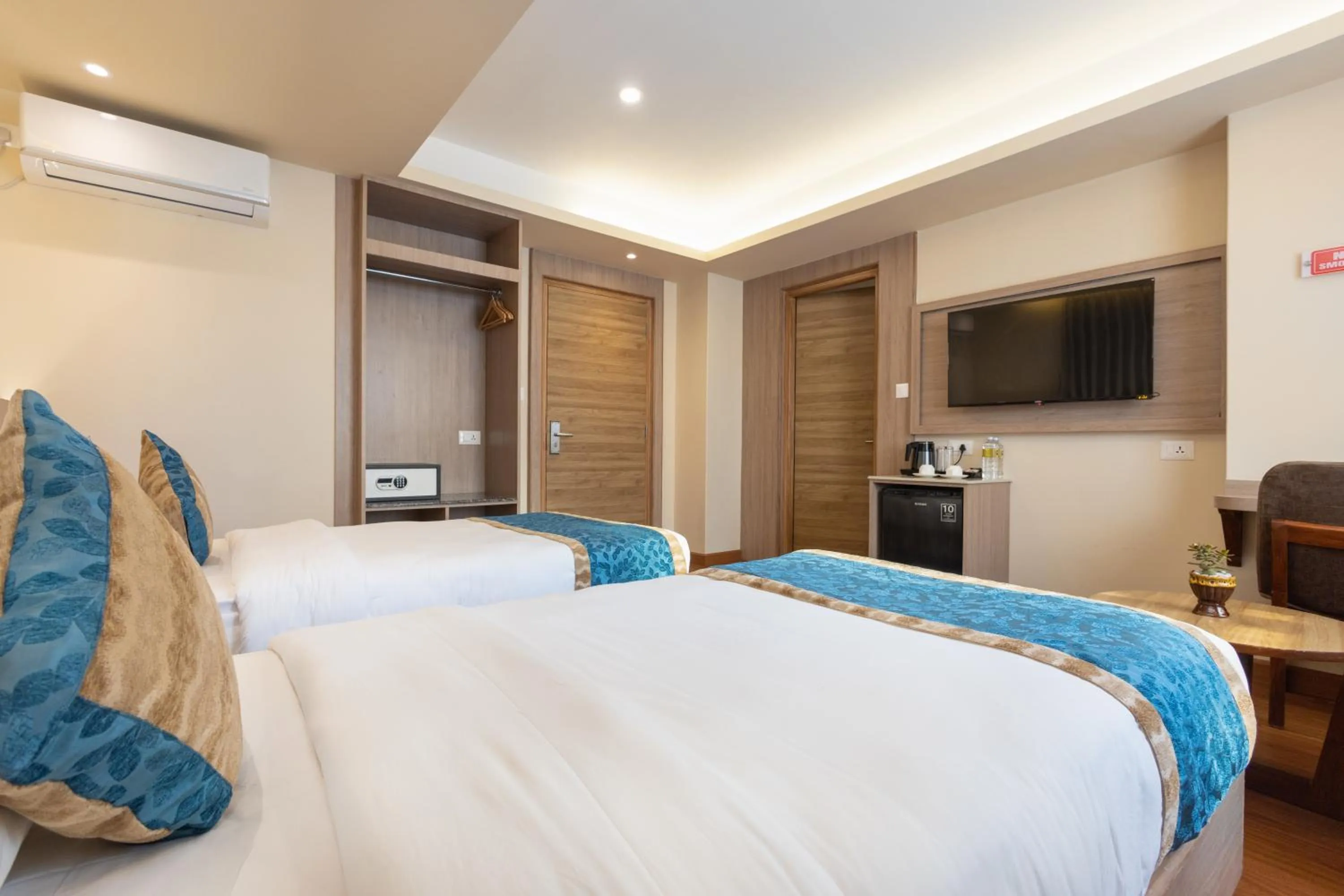 TV and multimedia, Bed in Shuvatara Suites & Spa, Thamel