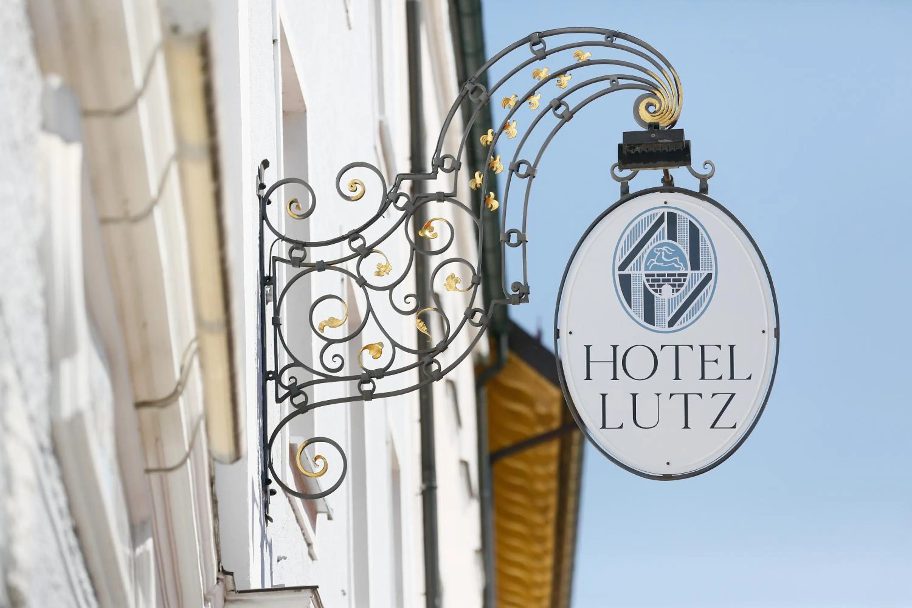 Property logo or sign in Hotel Lutz