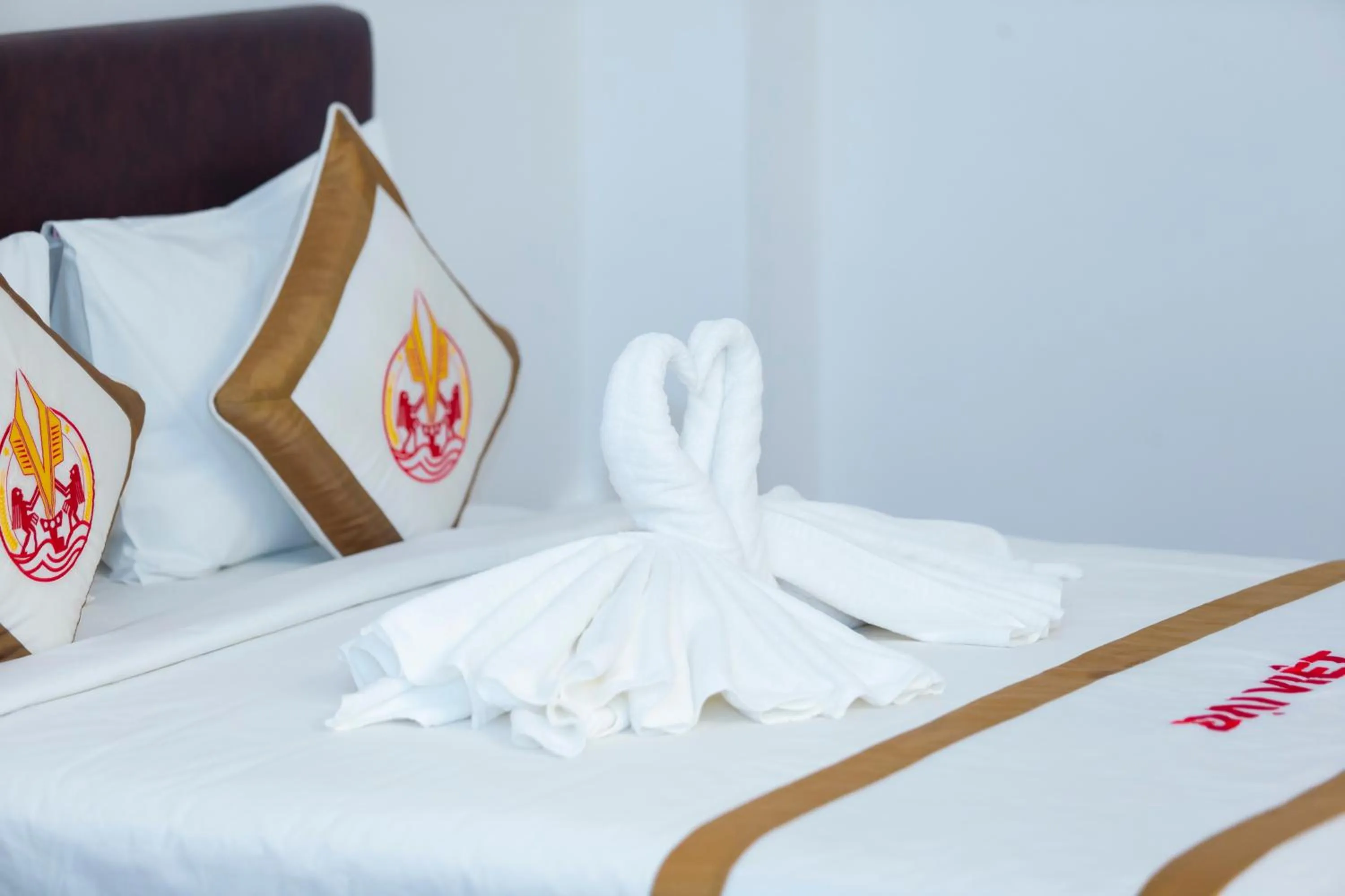 towels, Bed in THE RICE HOTEL Nong Thon Dai Viet 131 Bui Vien