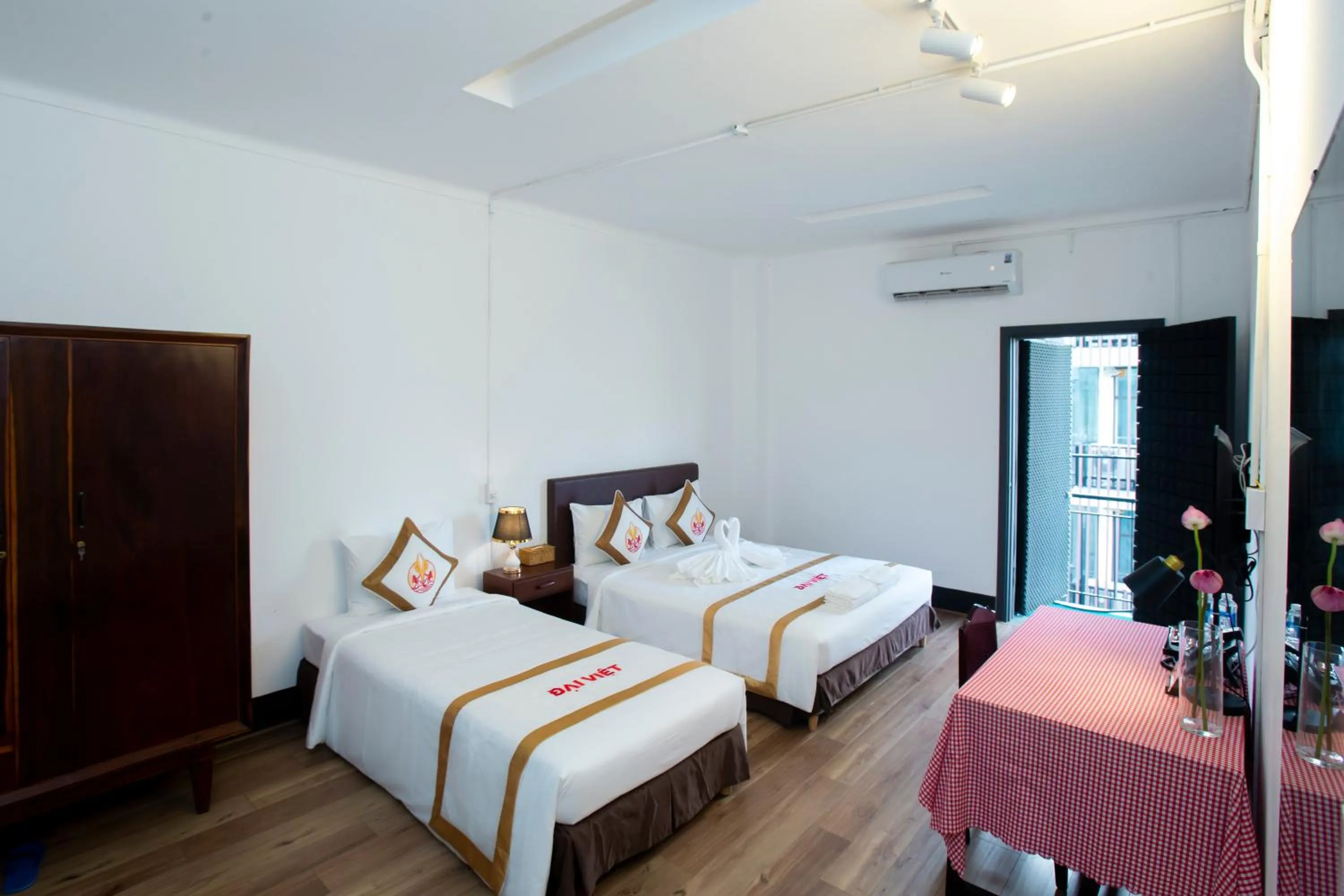 Bed in THE RICE HOTEL Nong Thon Dai Viet 131 Bui Vien