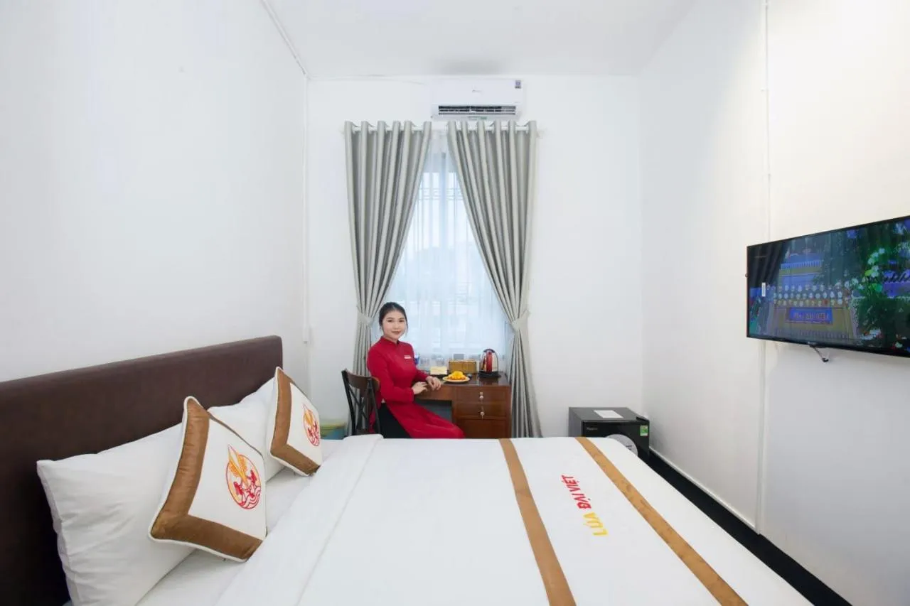 Bed in THE RICE HOTEL Nong Thon Dai Viet 131 Bui Vien