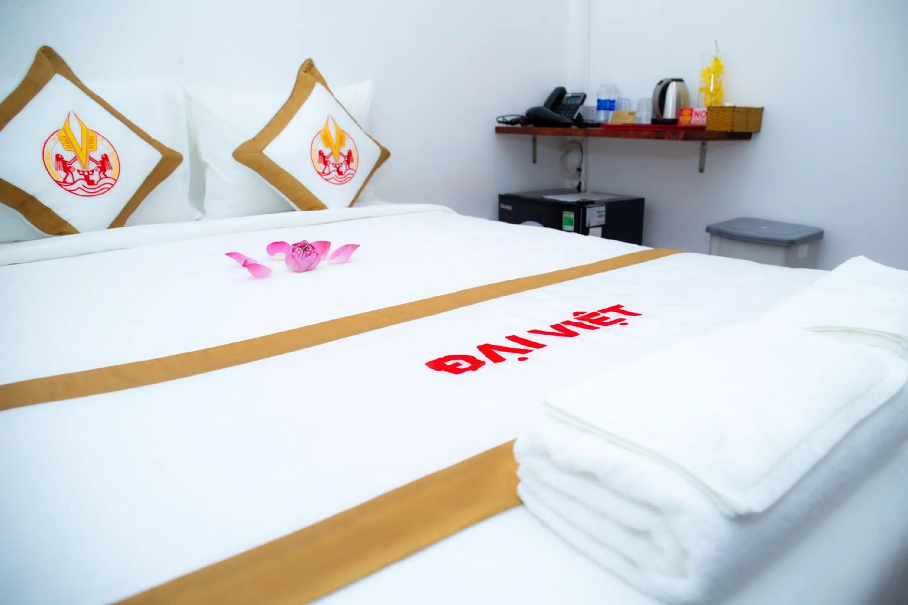 Bed in THE RICE HOTEL Nong Thon Dai Viet 131 Bui Vien