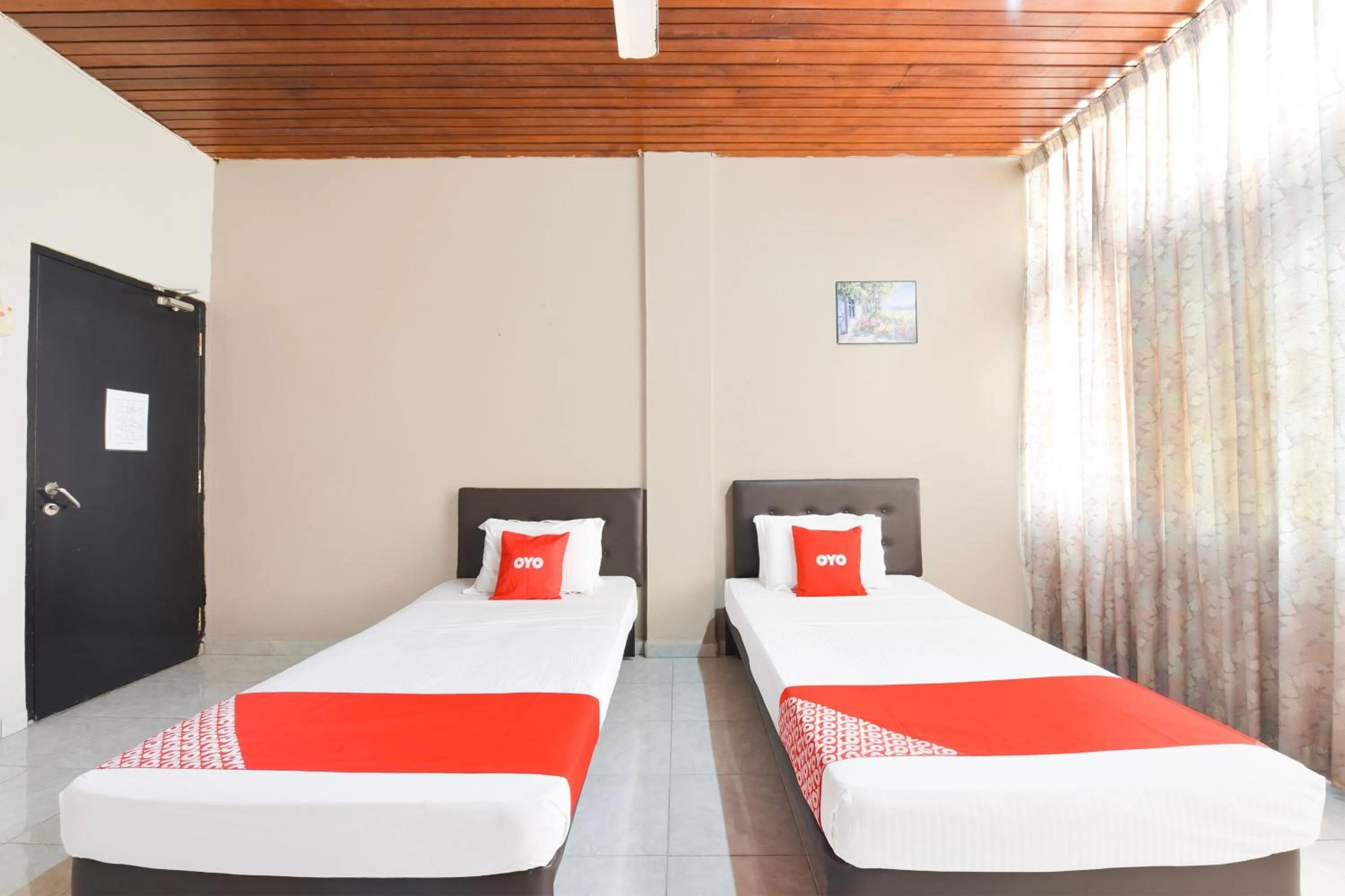 Bedroom in OYO 91052 Hotel Kenangan