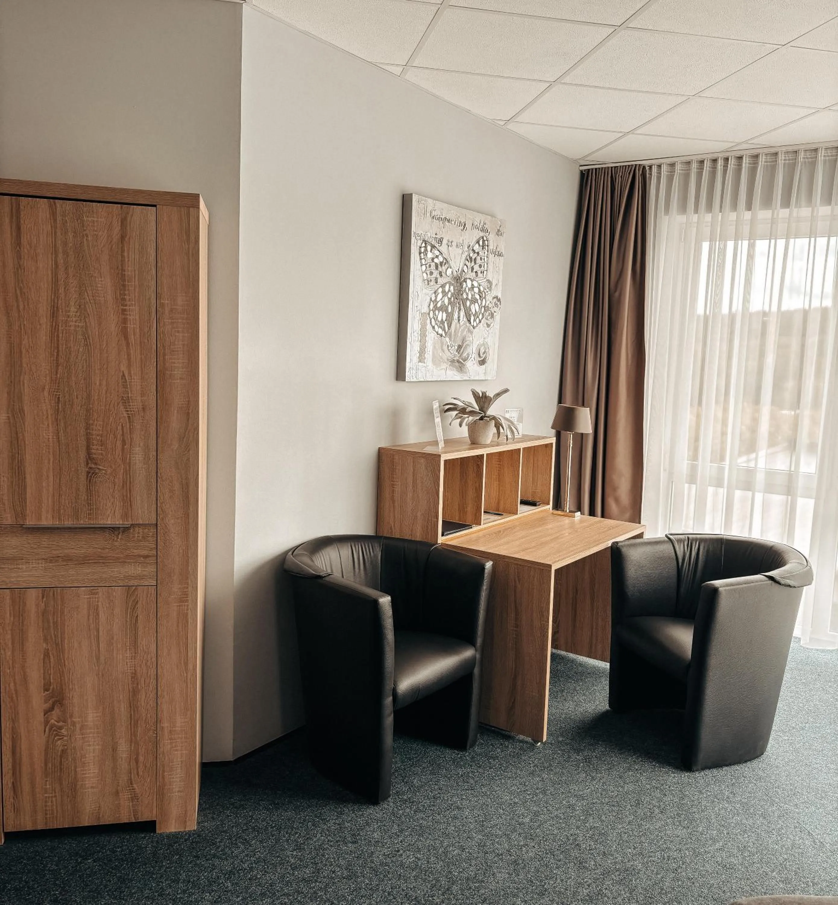 Seating area in Komm' In Hotel