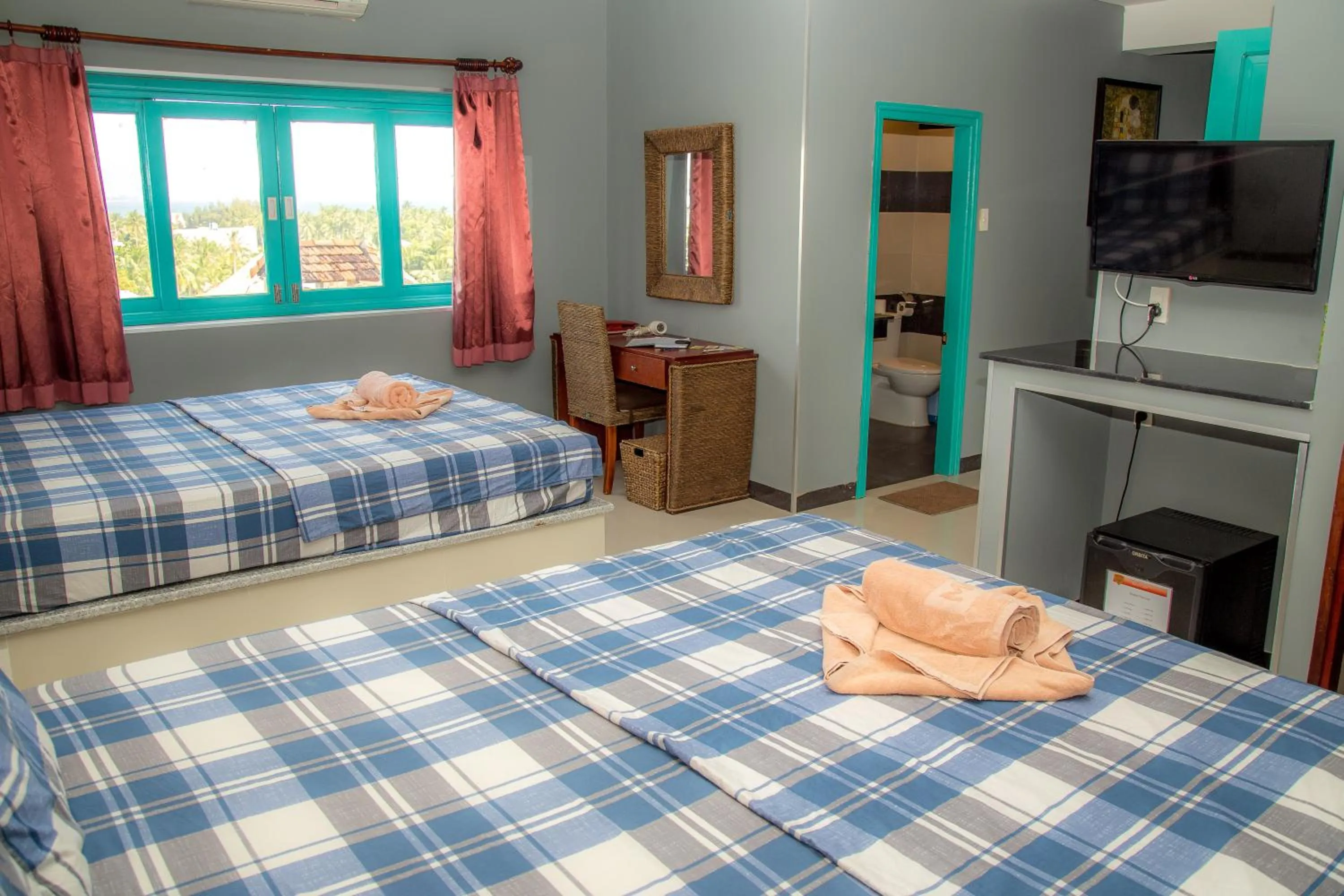 Photo of the whole room, Bed in Mui Ne Hills Bliss Hotel