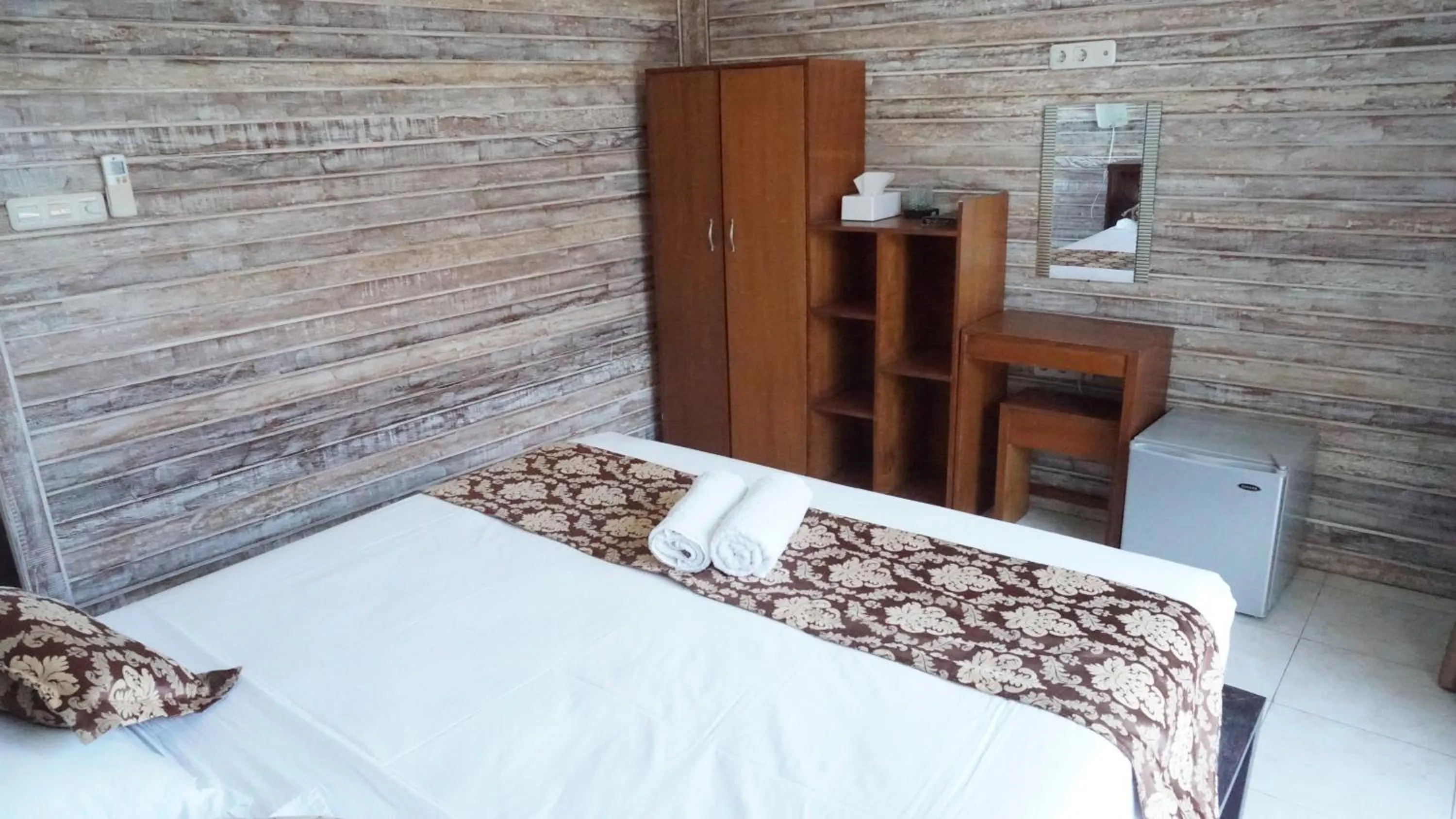 Photo of the whole room, Bed in Nyuh Gading Home Stay