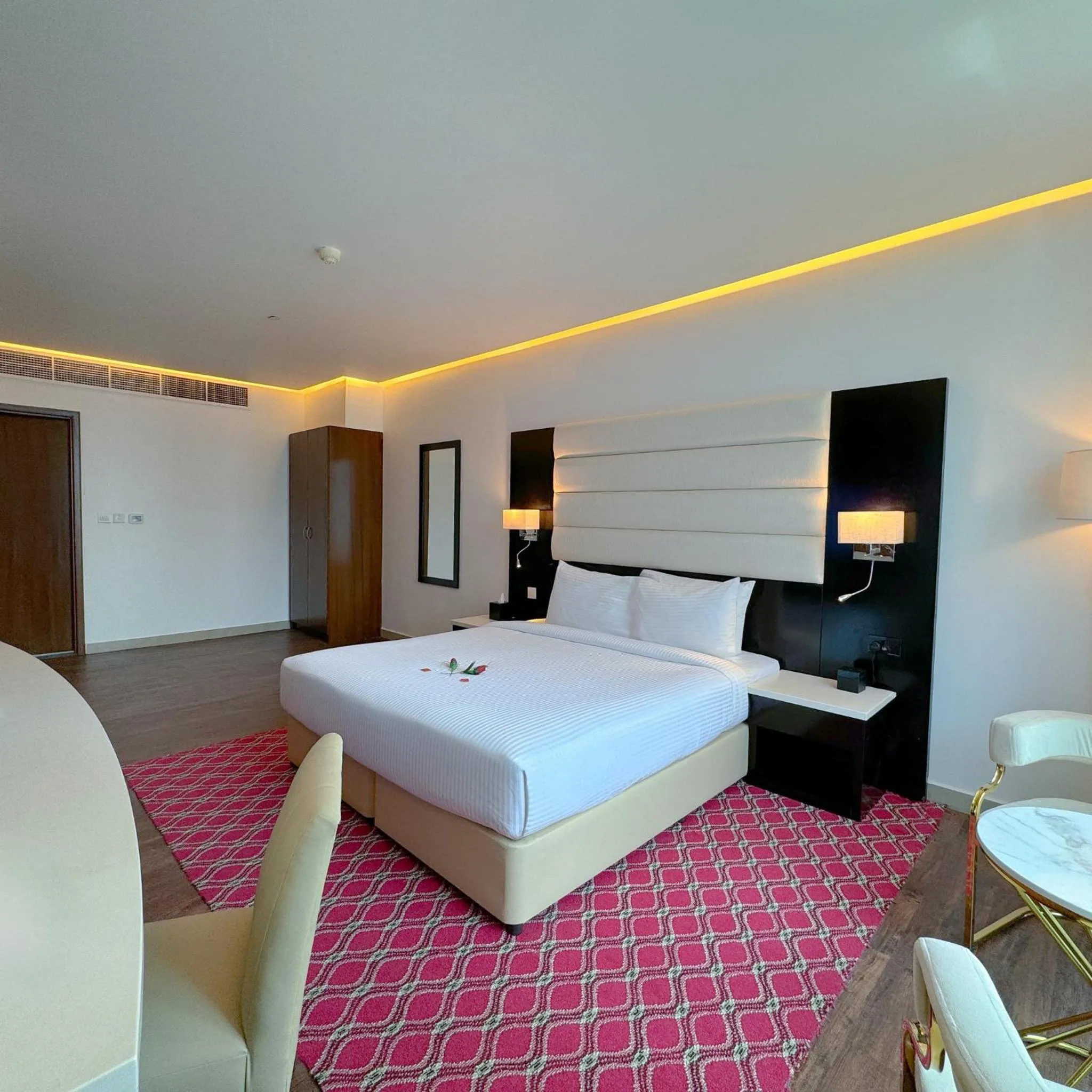Bed in Emirates Grand Hotel