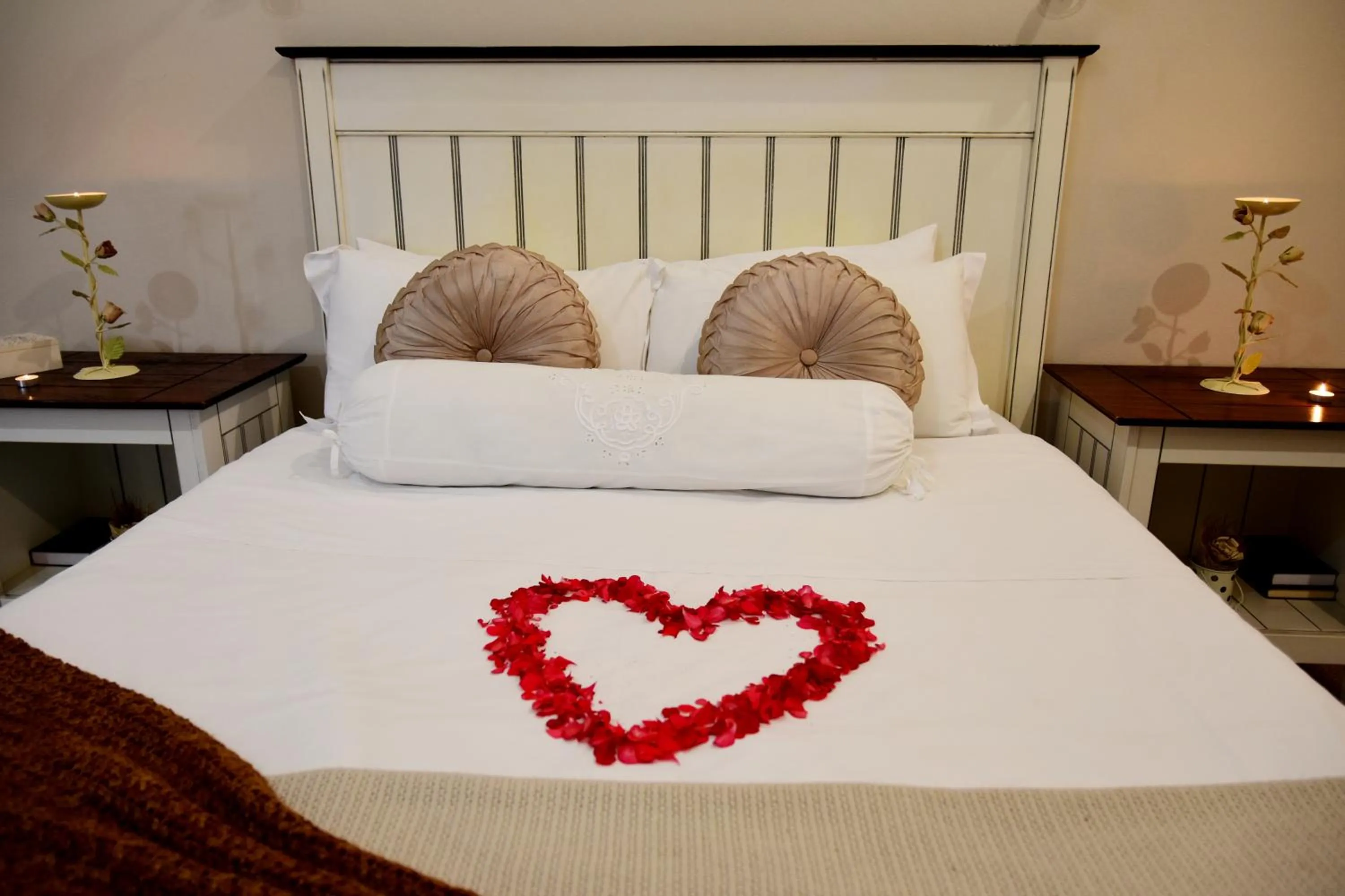 Bed in Riviera Hotel & Chalets