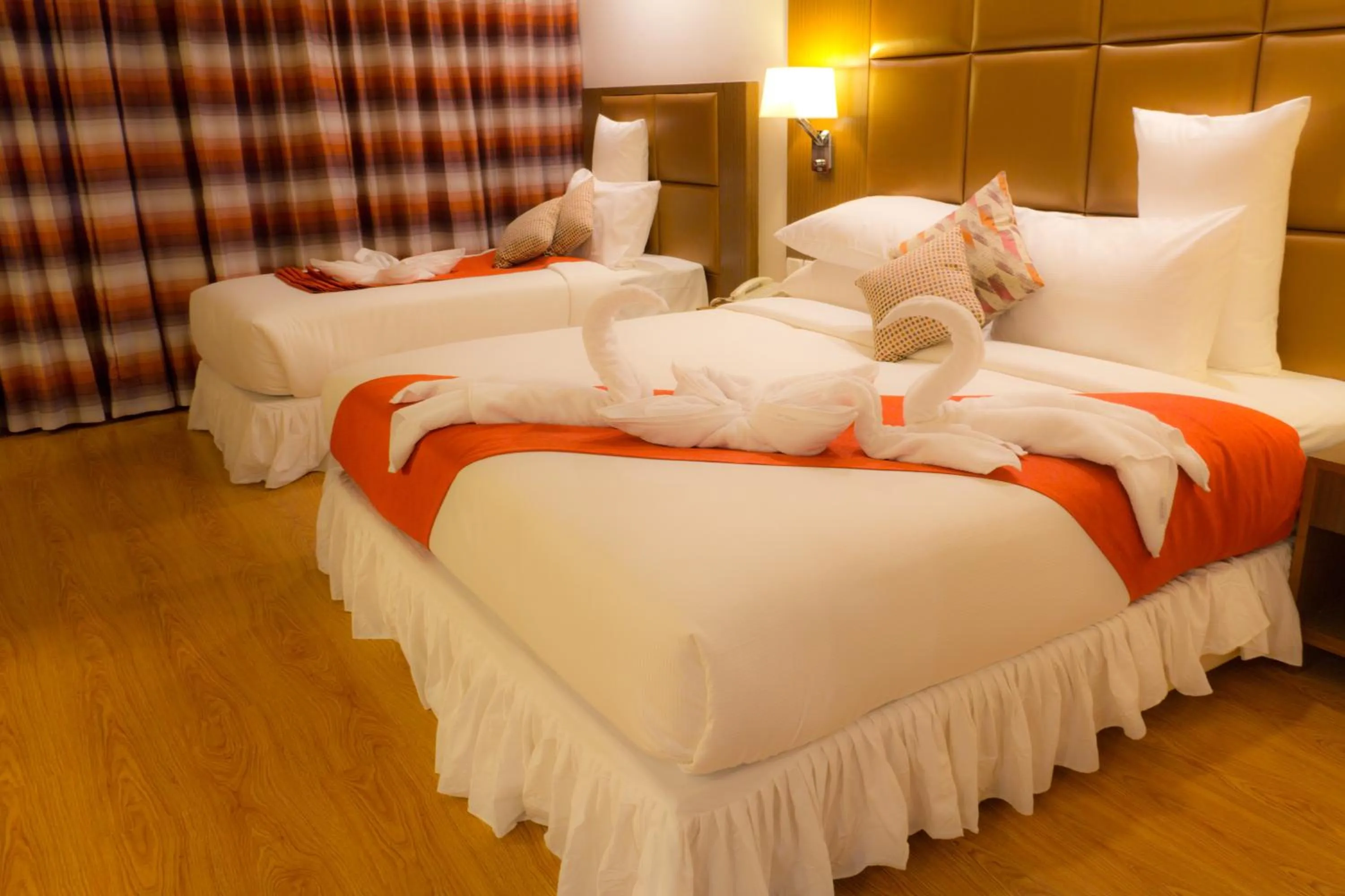 Bed in The Atrium Boutique Hotel