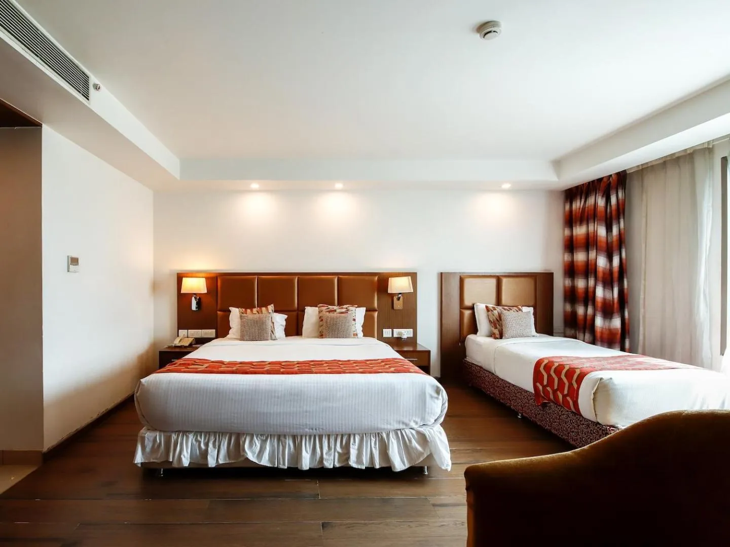 Bed in The Atrium Boutique Hotel