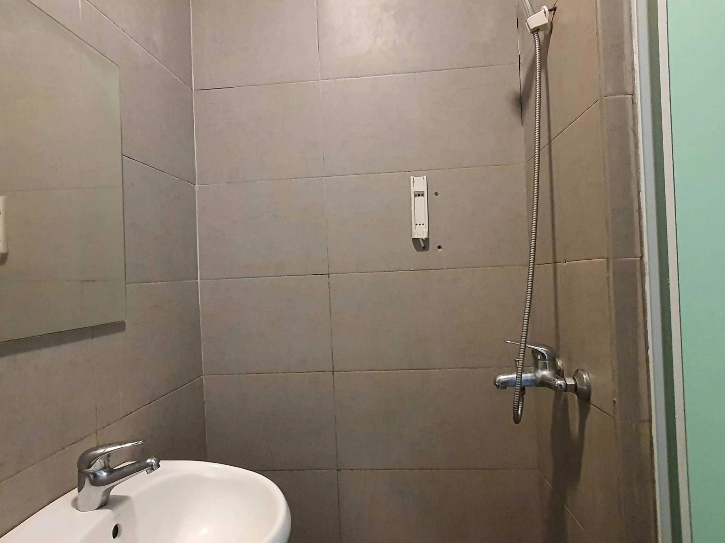 Bathroom in Hotel O Signature Inn Miri