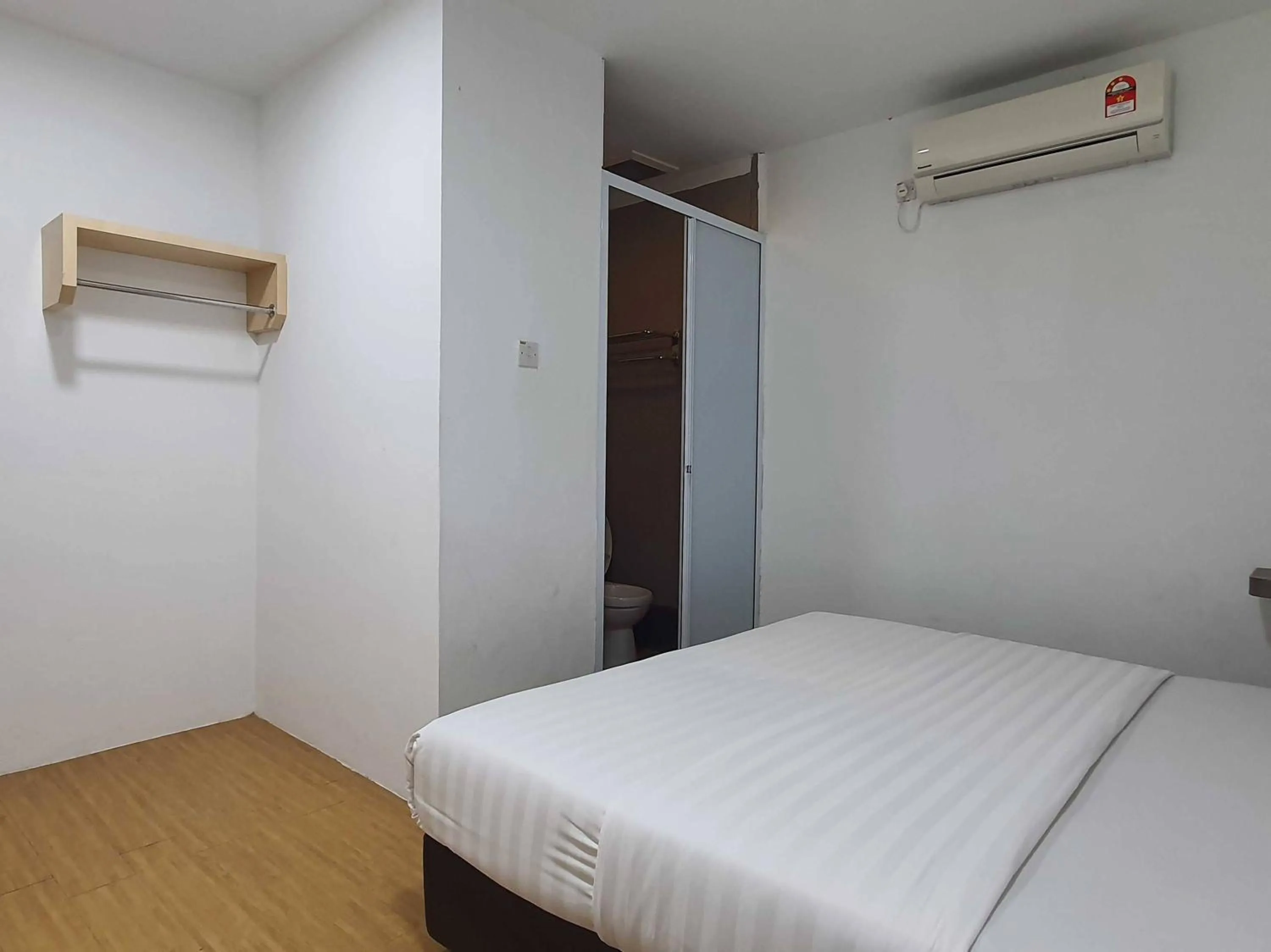 Bedroom in Hotel O Signature Inn Miri