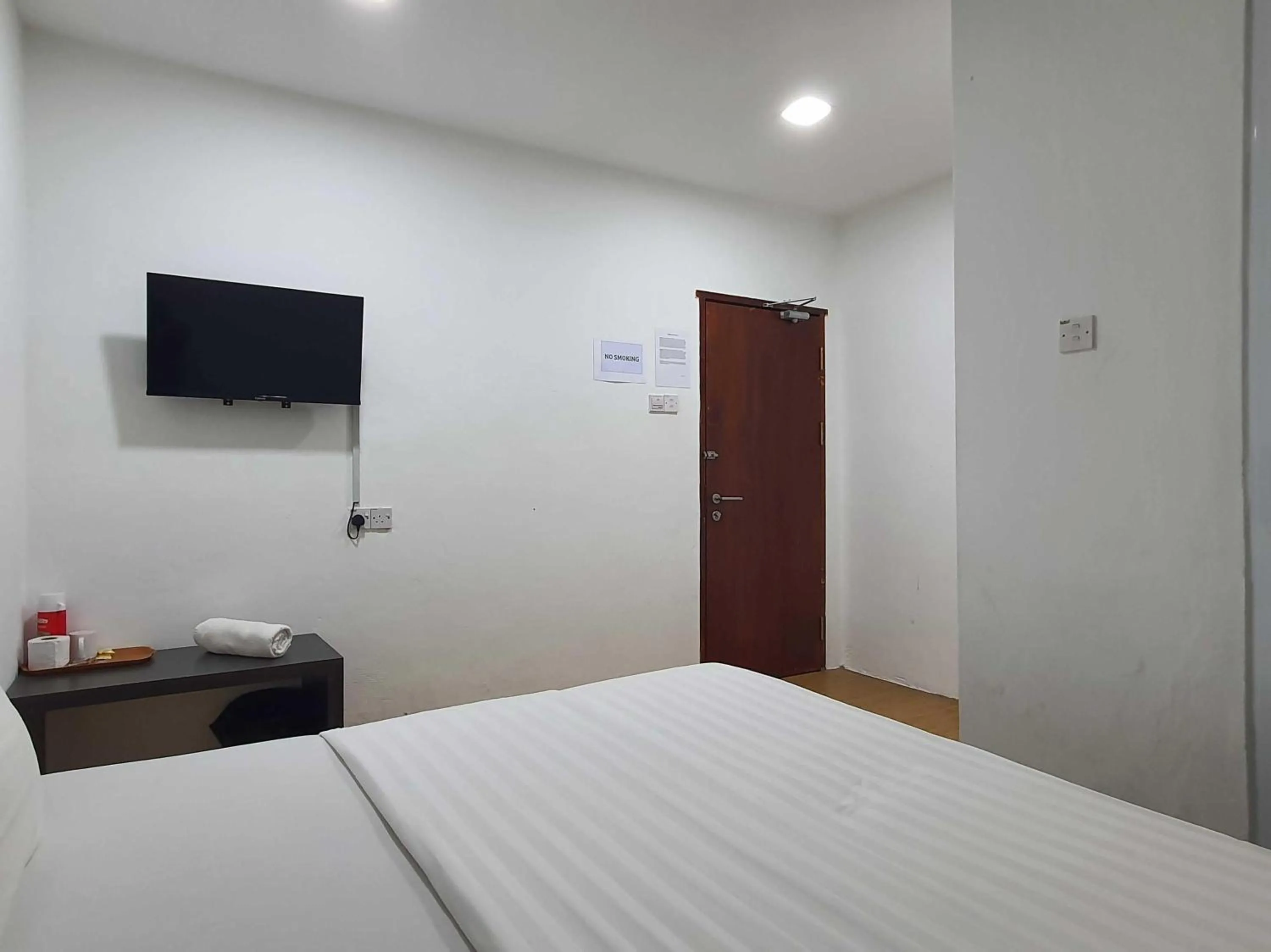 Bedroom in Hotel O Signature Inn Miri