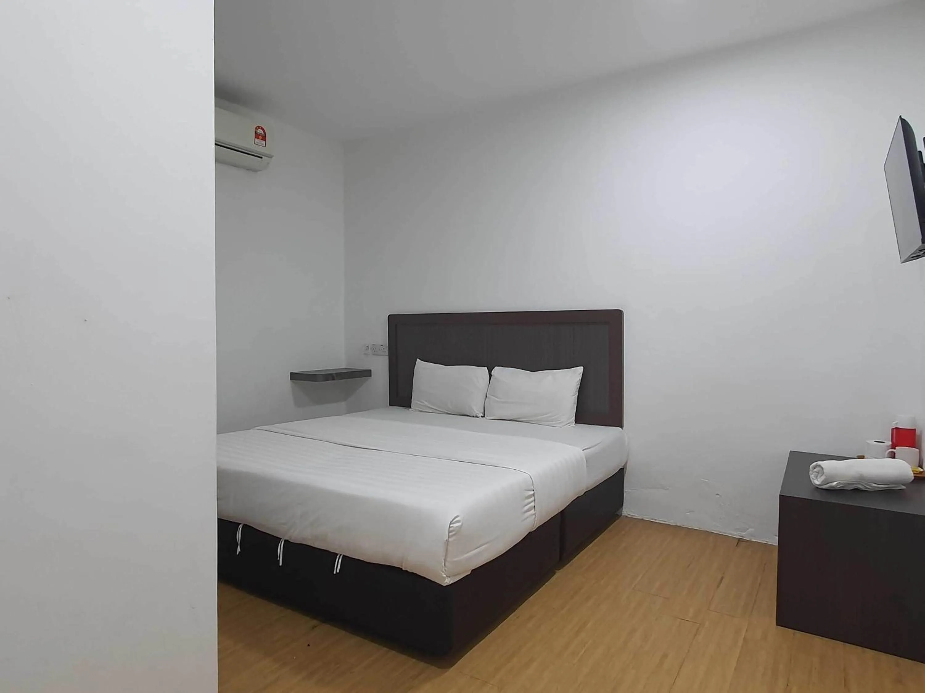 Bedroom in Hotel O Signature Inn Miri