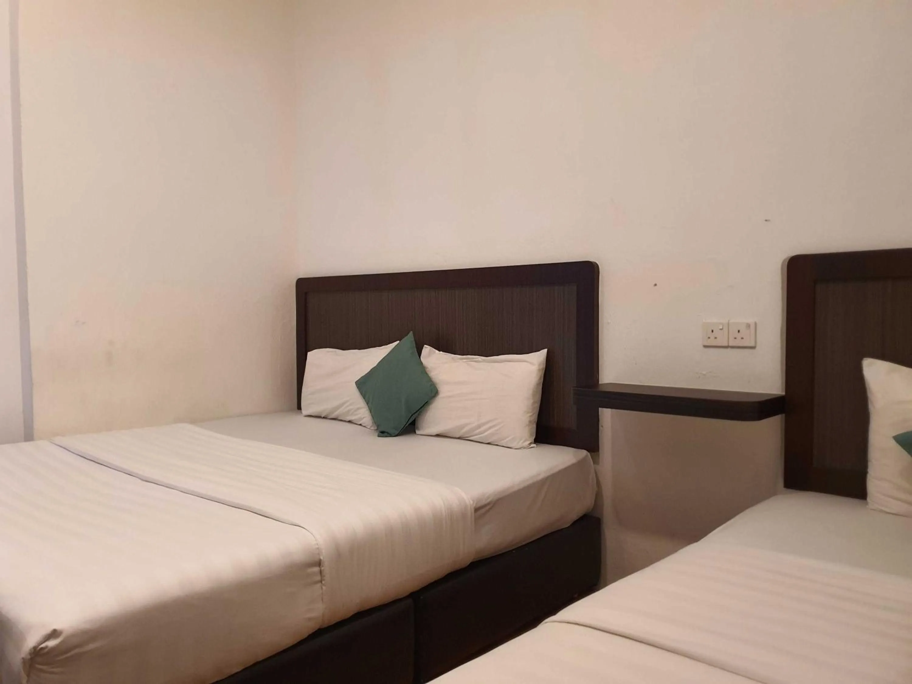 Bedroom in Hotel O Signature Inn Miri