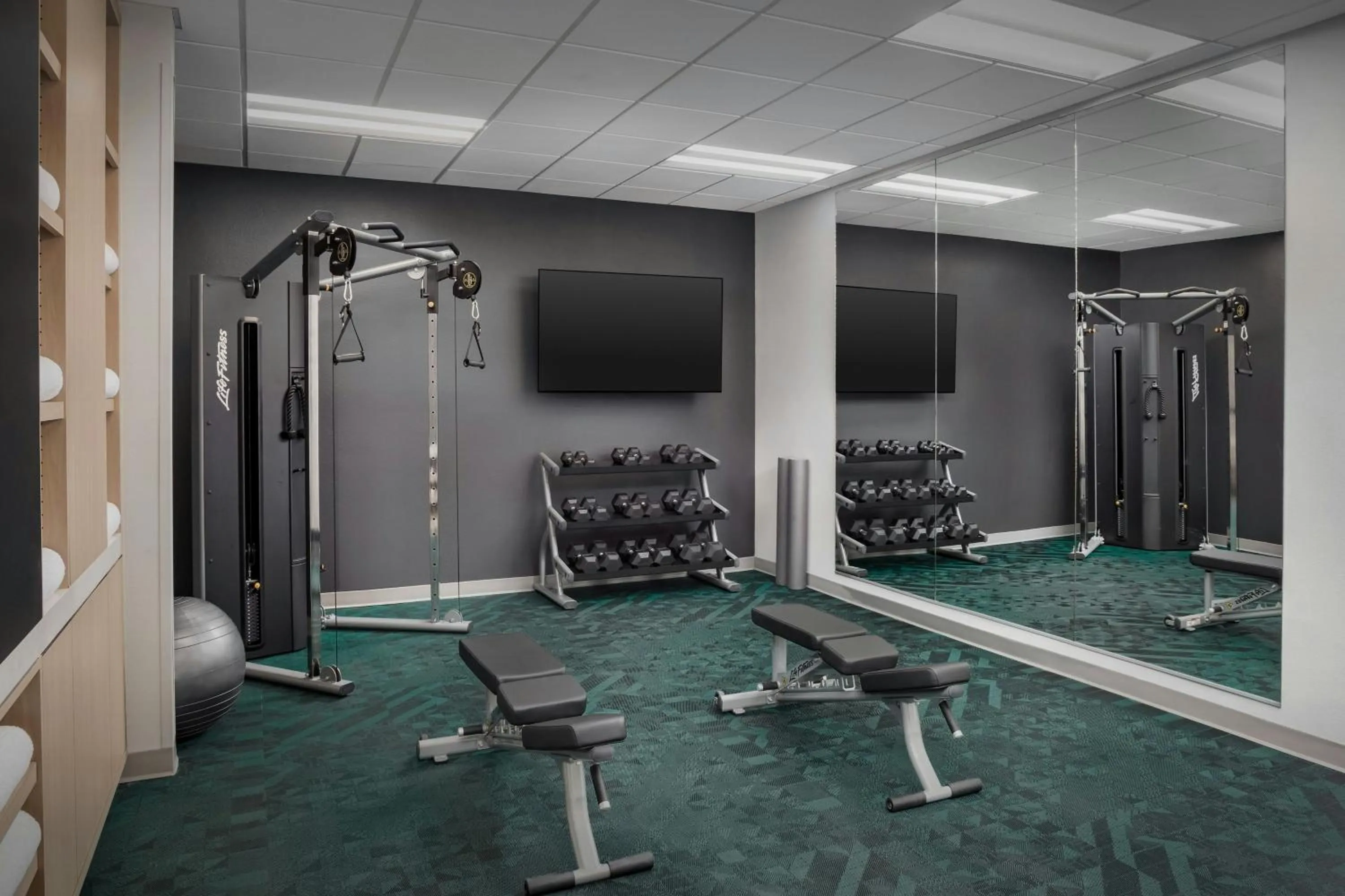 Fitness centre/facilities in TownePlace Suites by Marriott Forney
