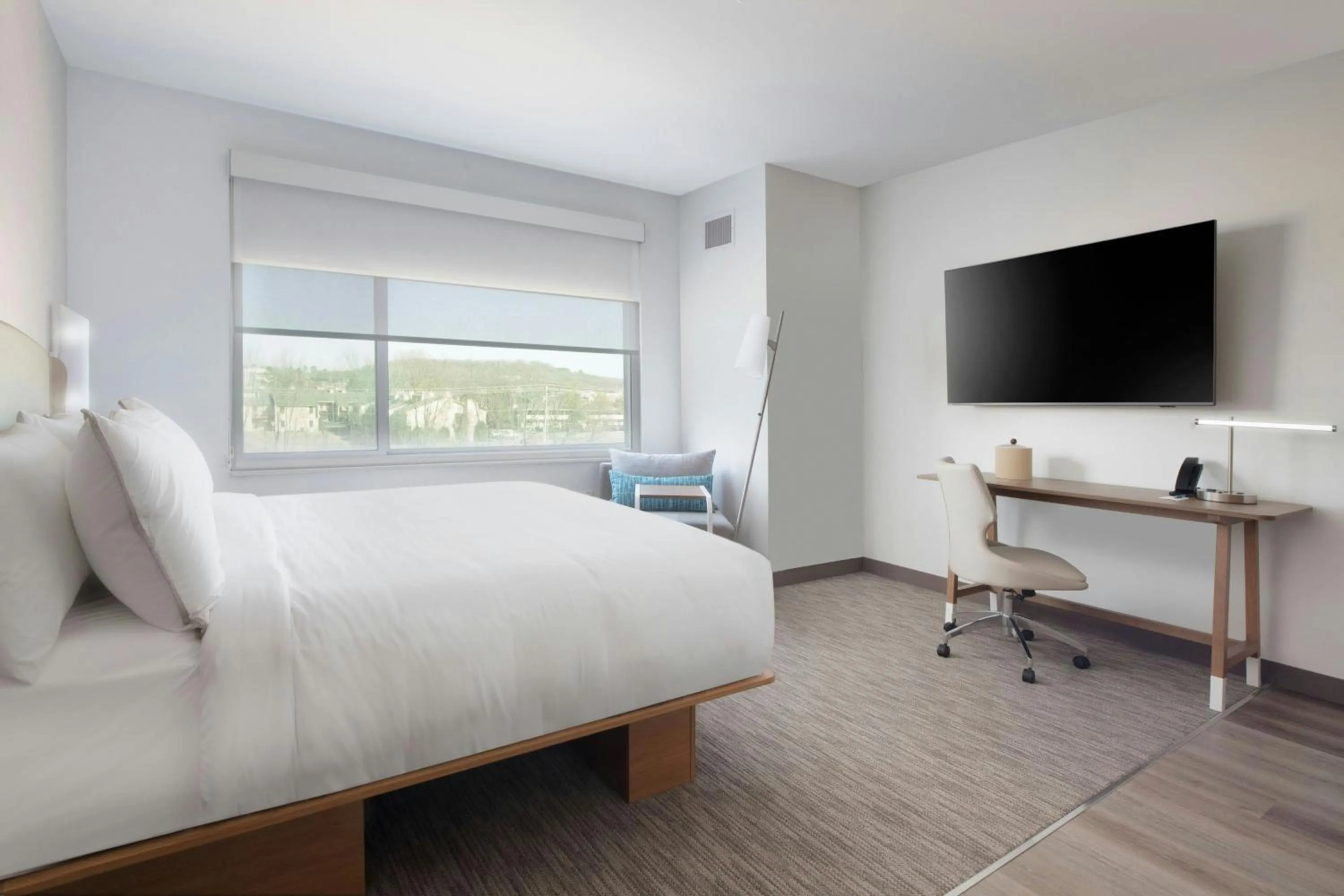 Photo of the whole room, Bed in Element Fort Smith