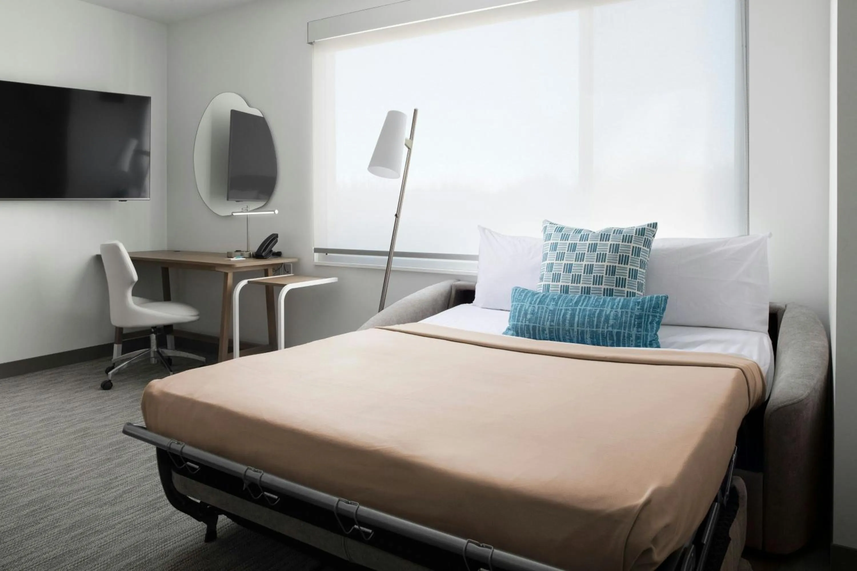 Photo of the whole room, Bed in Element Fort Smith