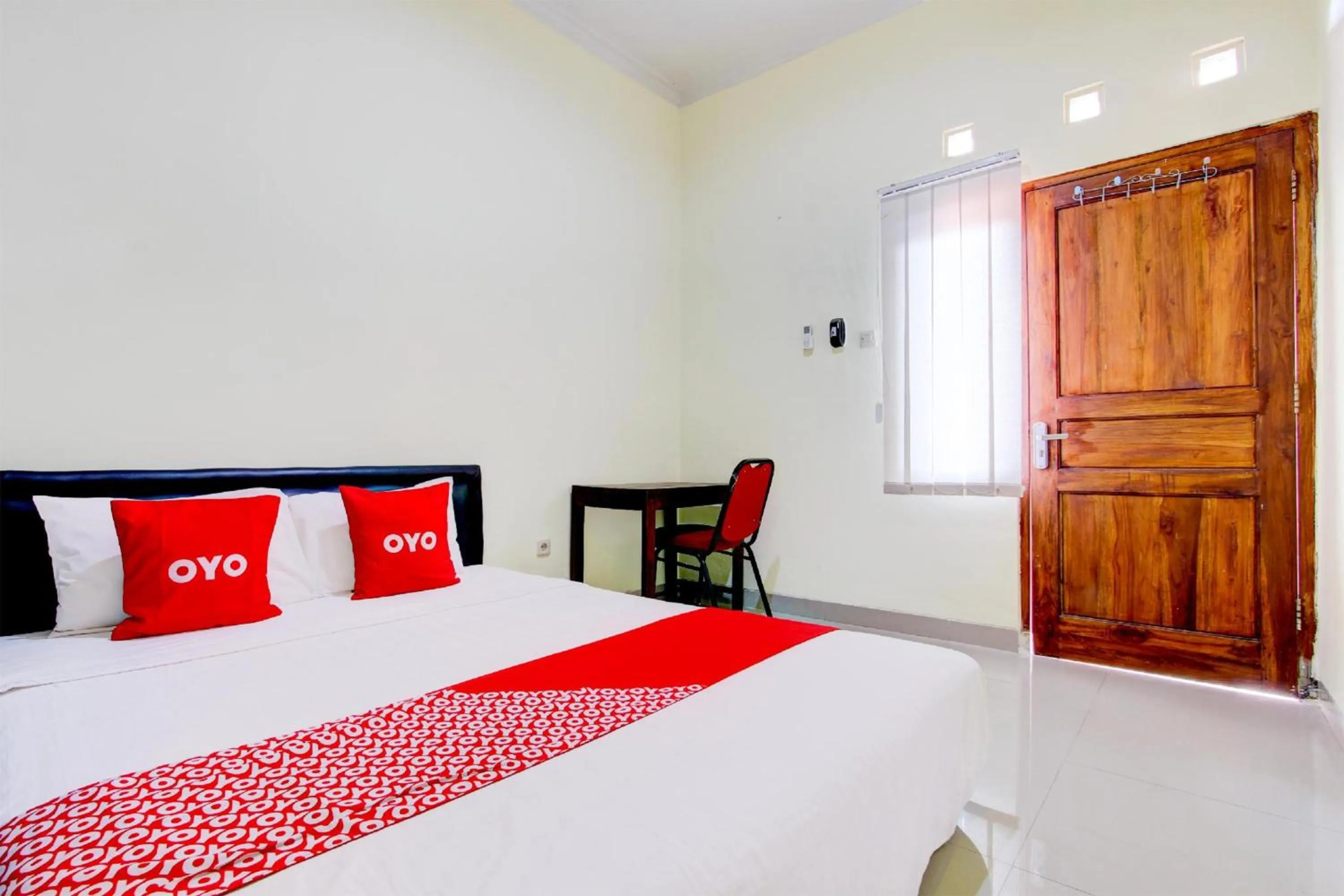 View (from property/room), Bed in Hotel O Sleman Near Bandara Adi Sutjipto Formerly Joglo Sorogenen