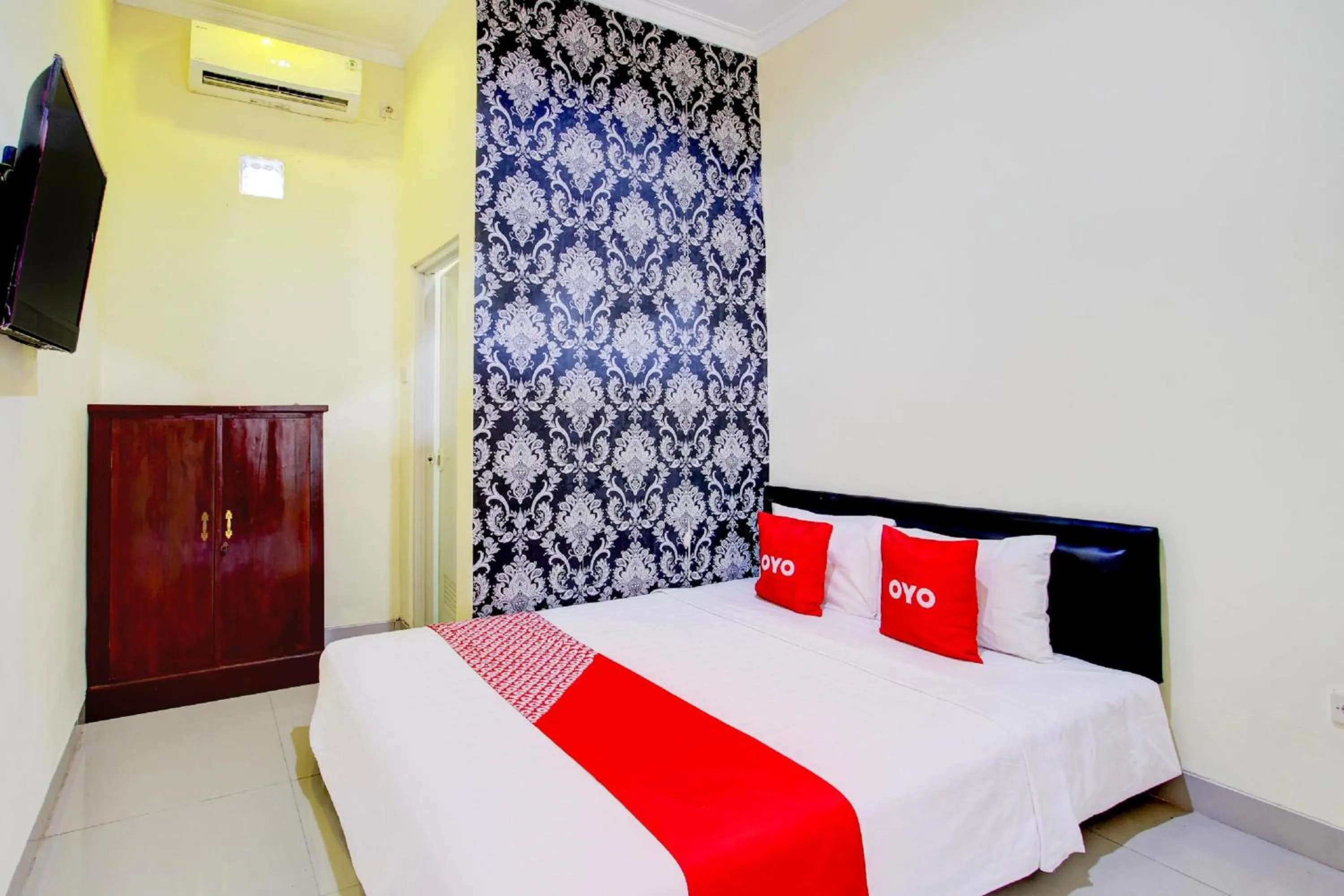 View (from property/room), Bed in Hotel O Sleman Near Bandara Adi Sutjipto Formerly Joglo Sorogenen