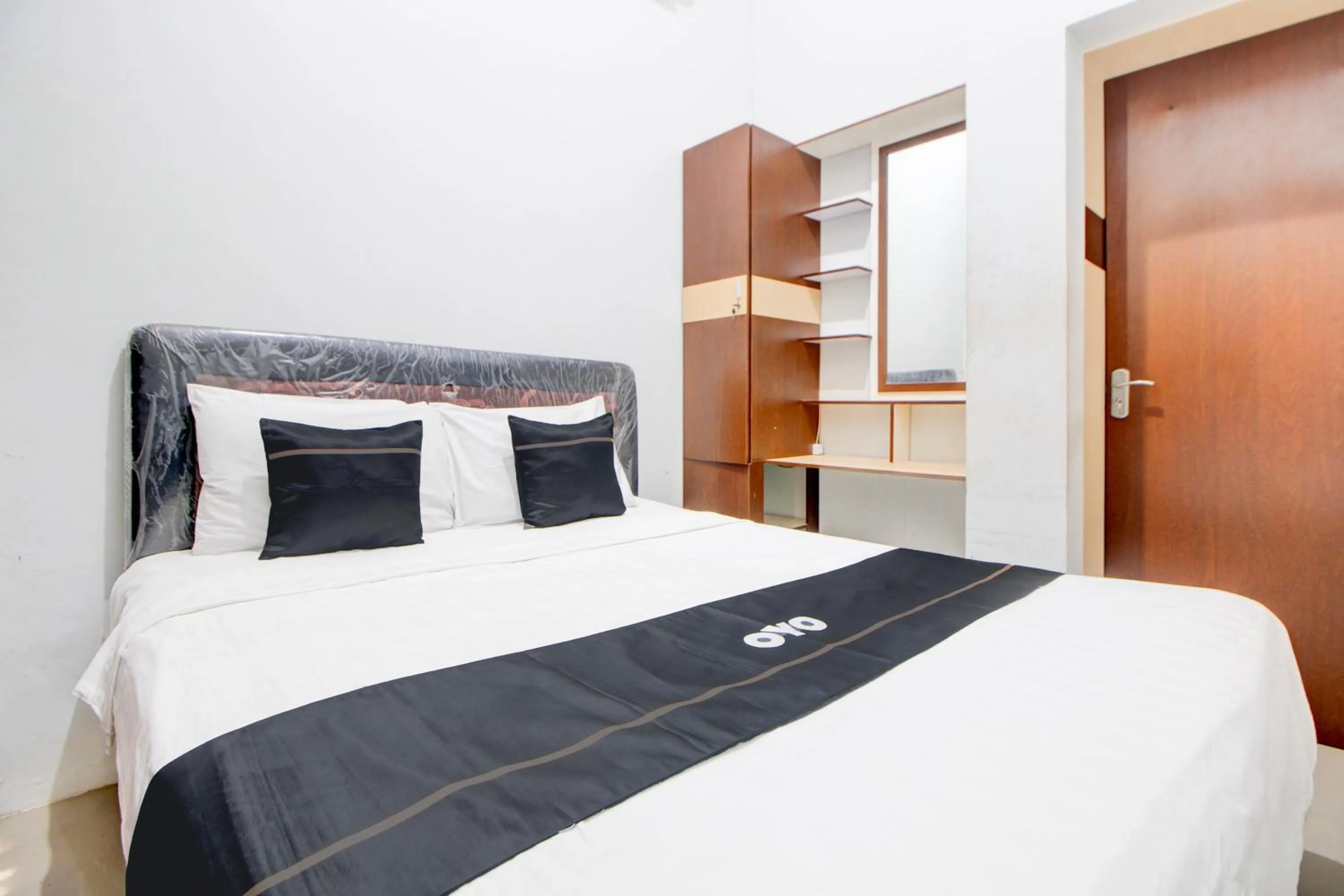 Bedroom, Bed in Capital O 94314 Sunny Co Living