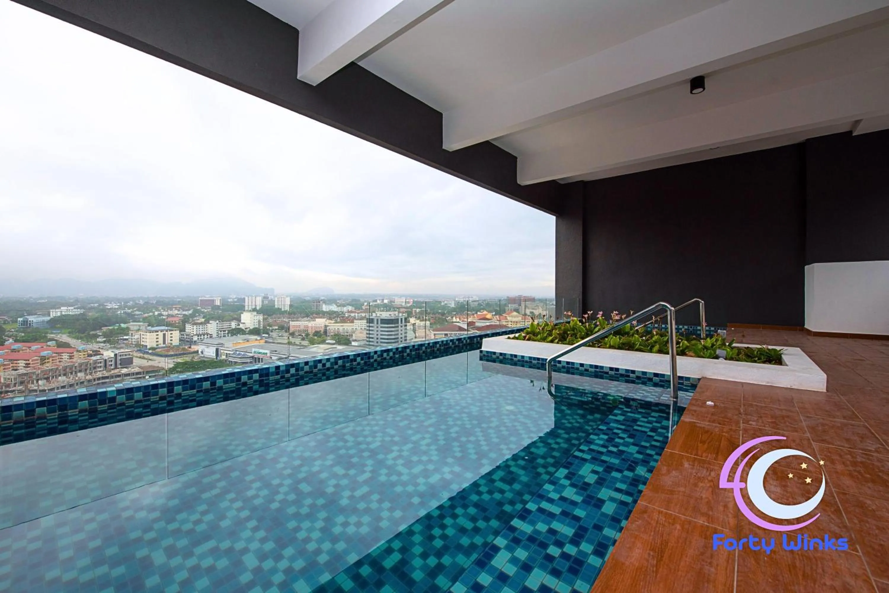 Swimming pool in The Horizon Ipoh by 40 Winks