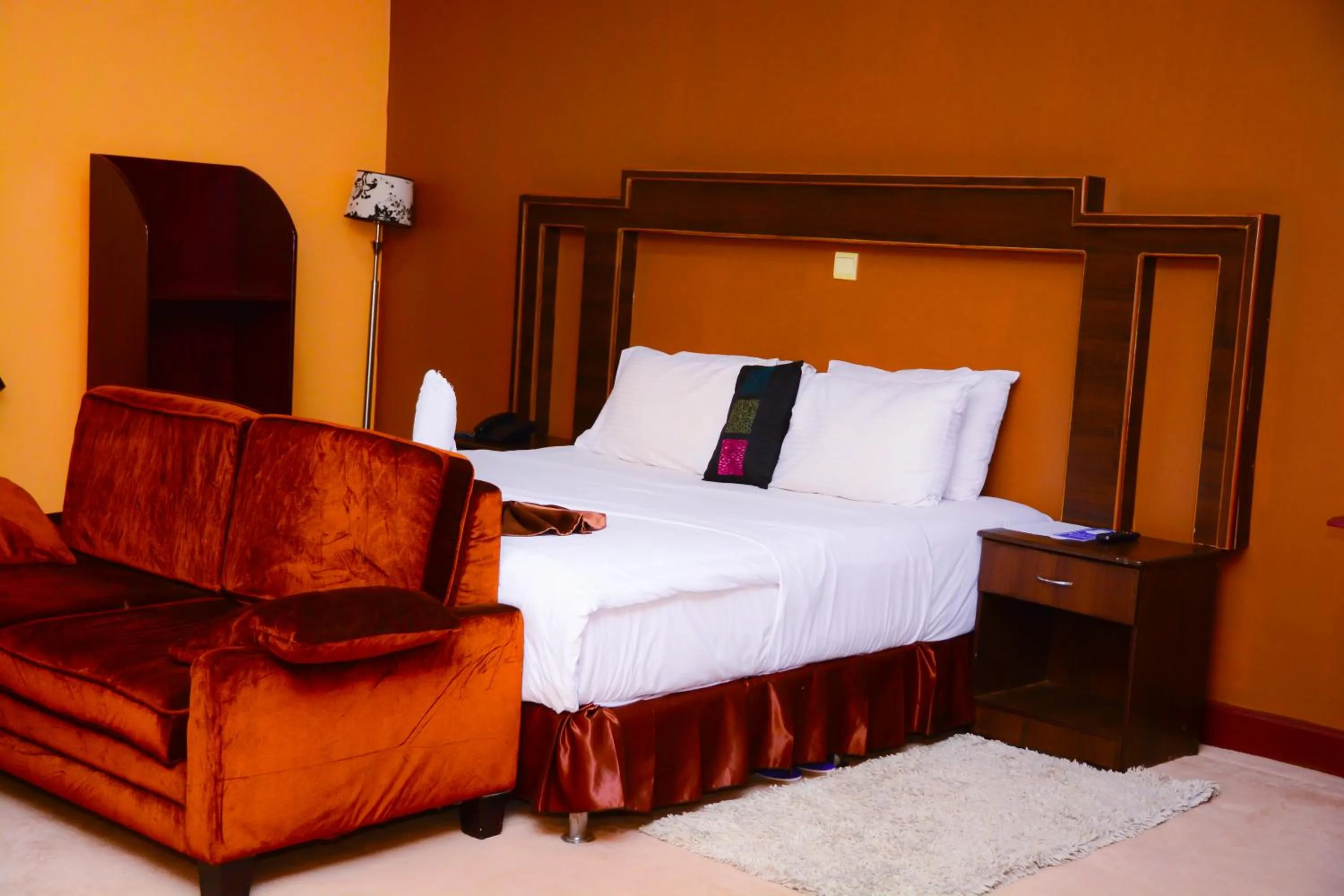 Bed in The Country Inn Hotel