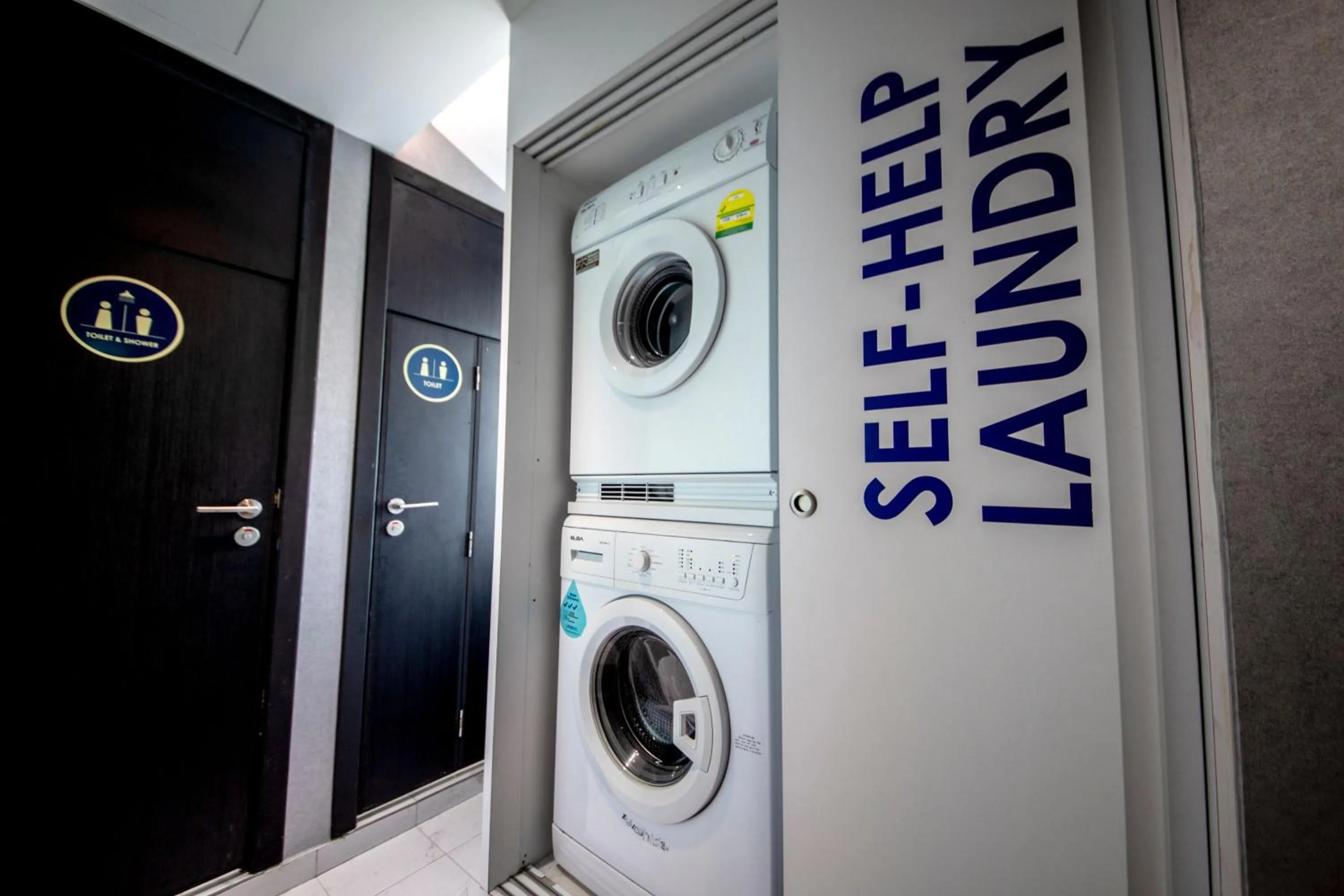 washing machine in CUBE Boutique Capsule Hotel at Kampong Glam