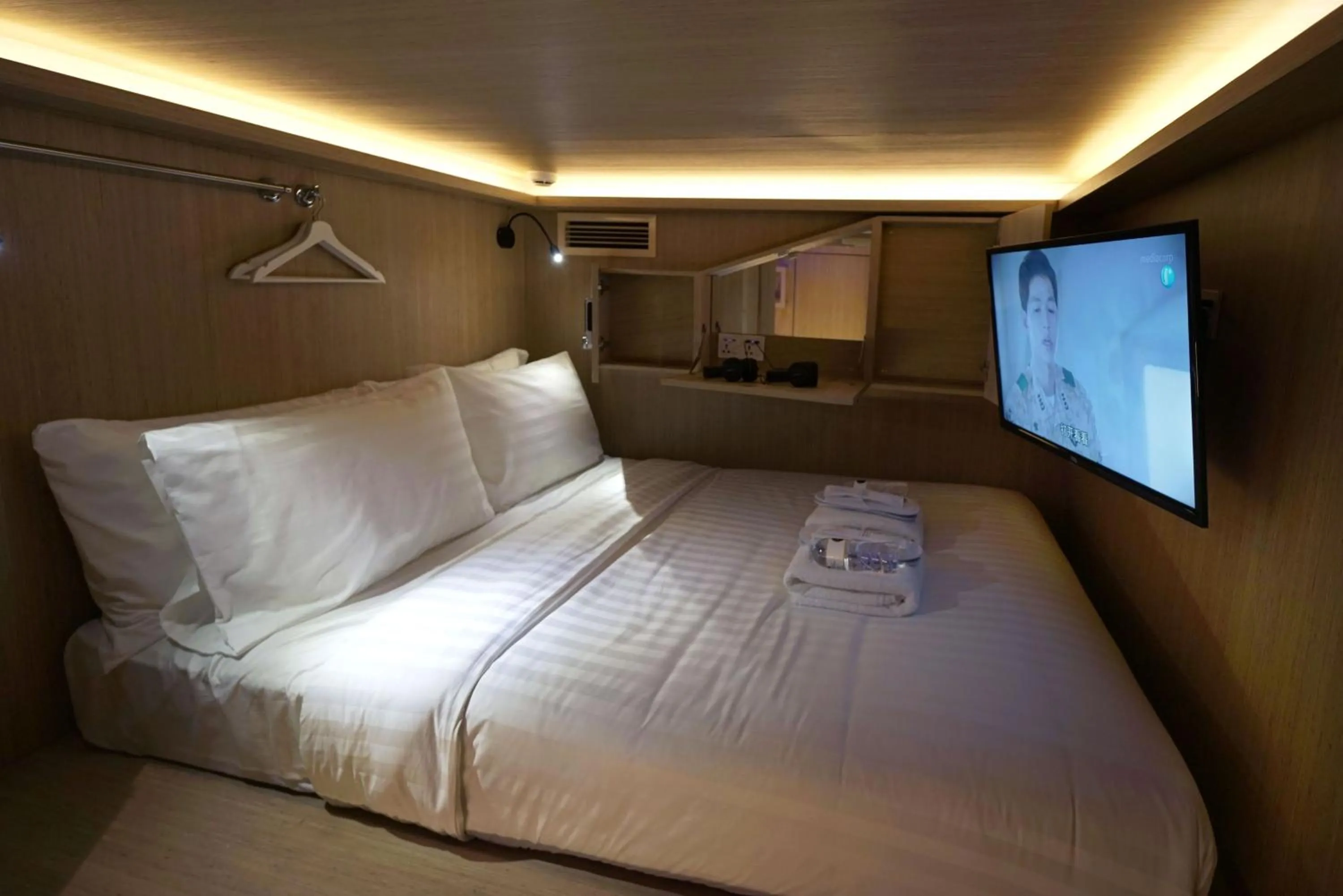 Bed in CUBE Boutique Capsule Hotel at Kampong Glam