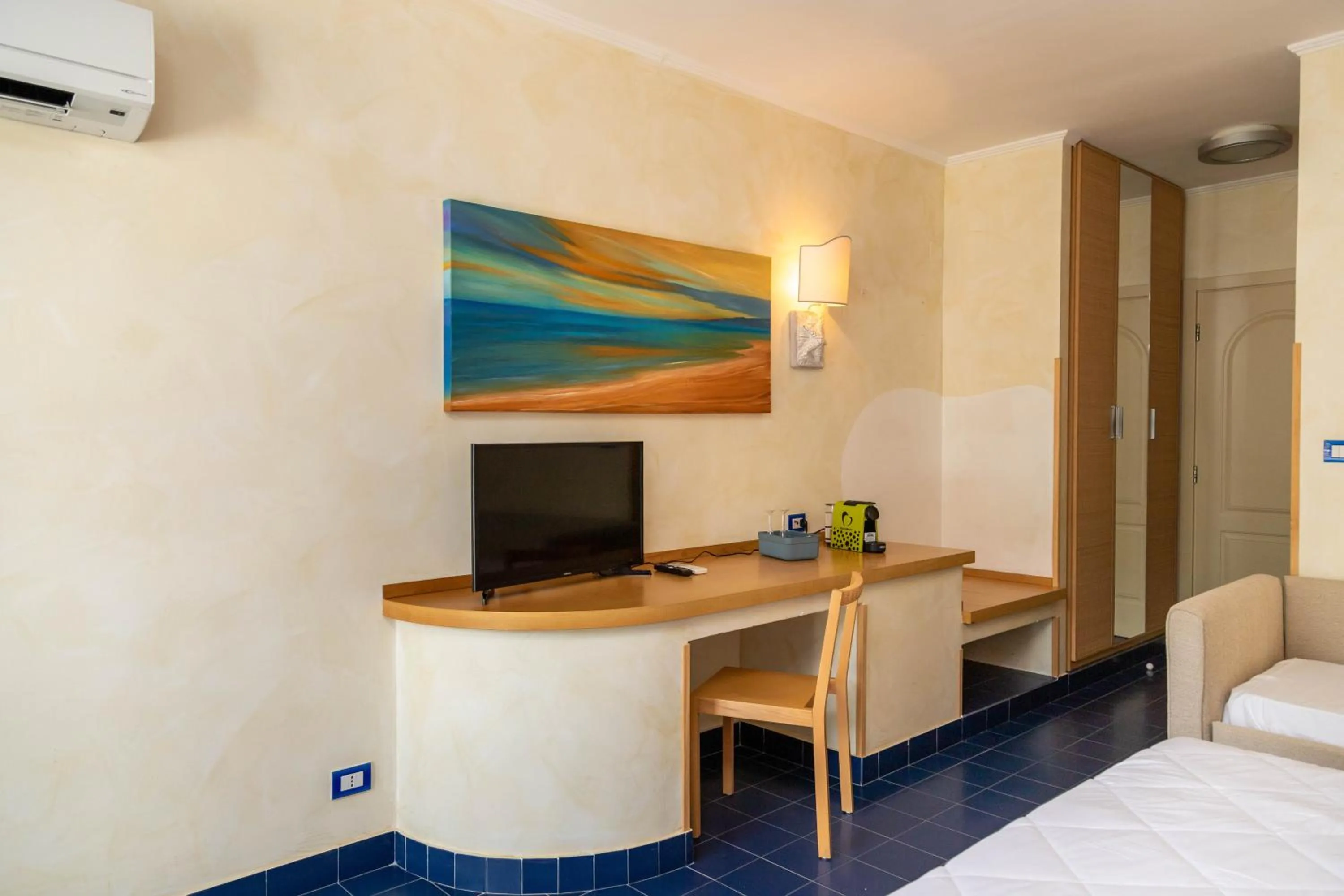 Bed in AH Premium Baia dei Faraglioni