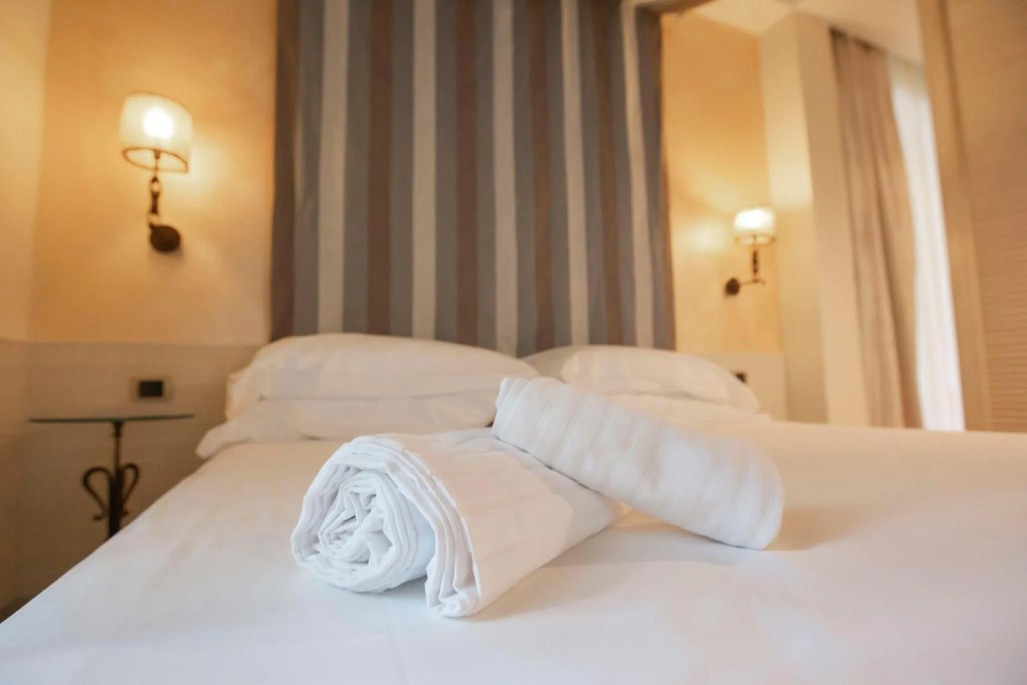 Bed in AH Premium Baia dei Faraglioni