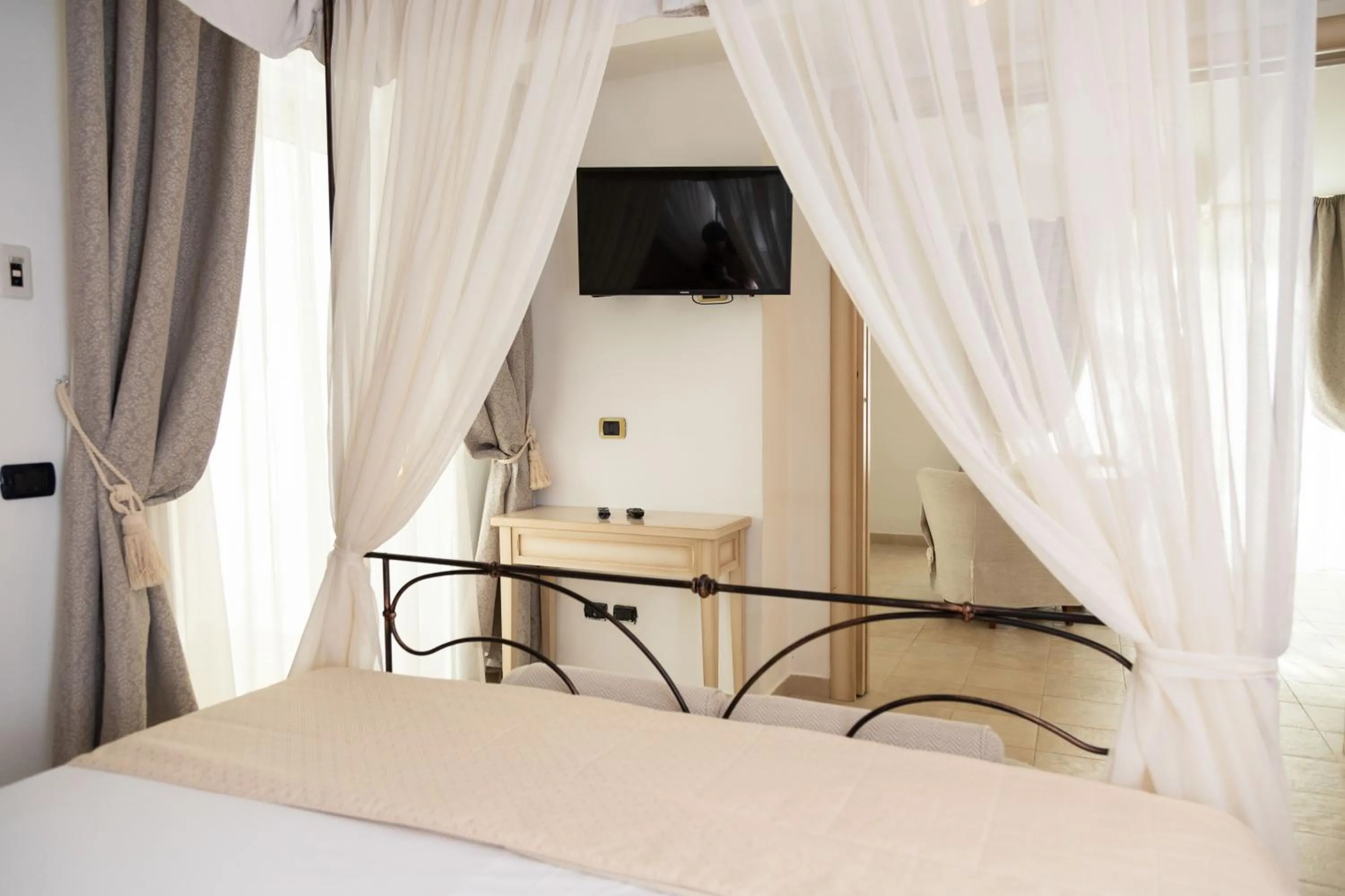 Bed in AH Premium Baia dei Faraglioni