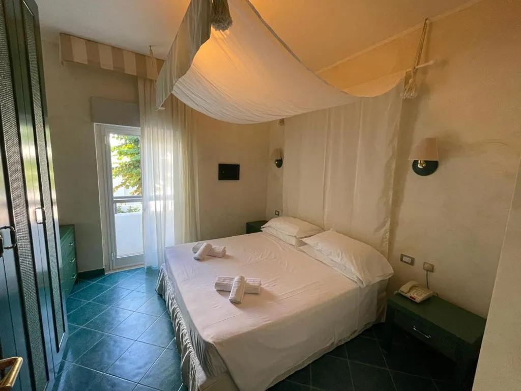 Photo of the whole room, Bed in AH Premium Baia dei Faraglioni