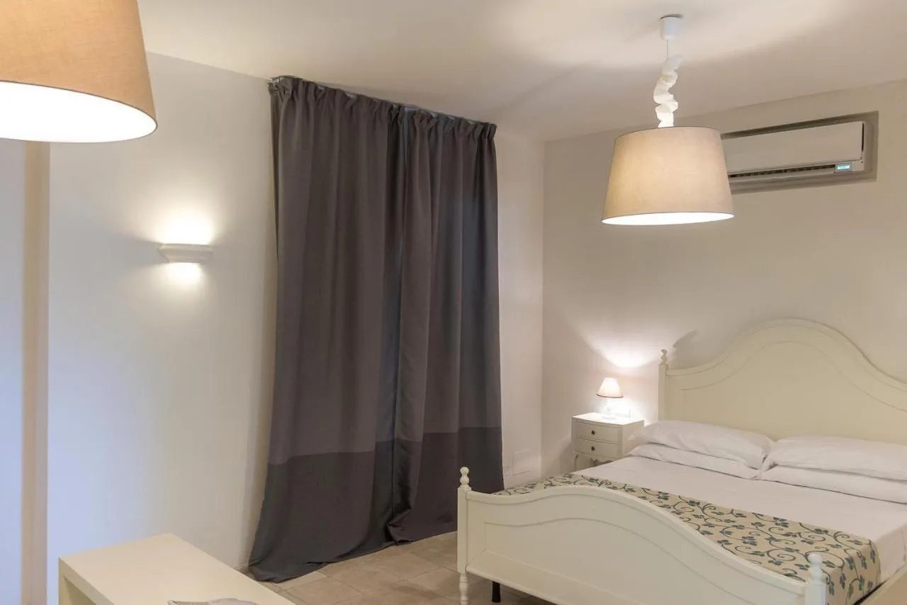 Bed in AH Premium Baia dei Faraglioni