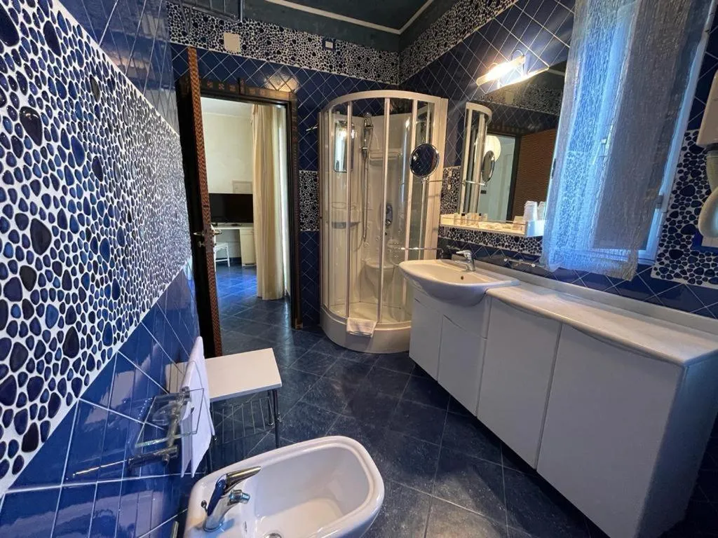 Bathroom in AH Premium Baia dei Faraglioni