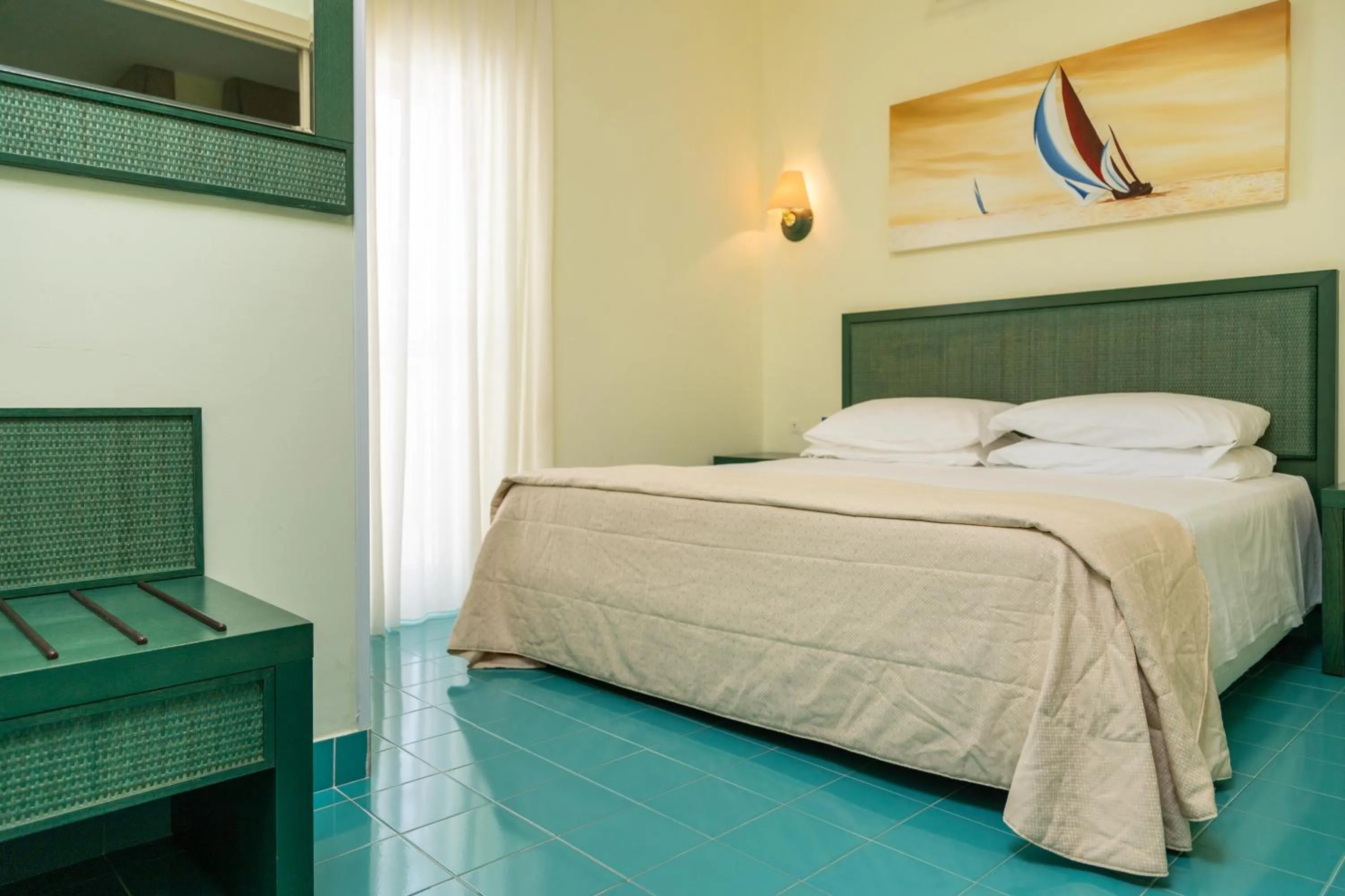 Bed in AH Premium Baia dei Faraglioni