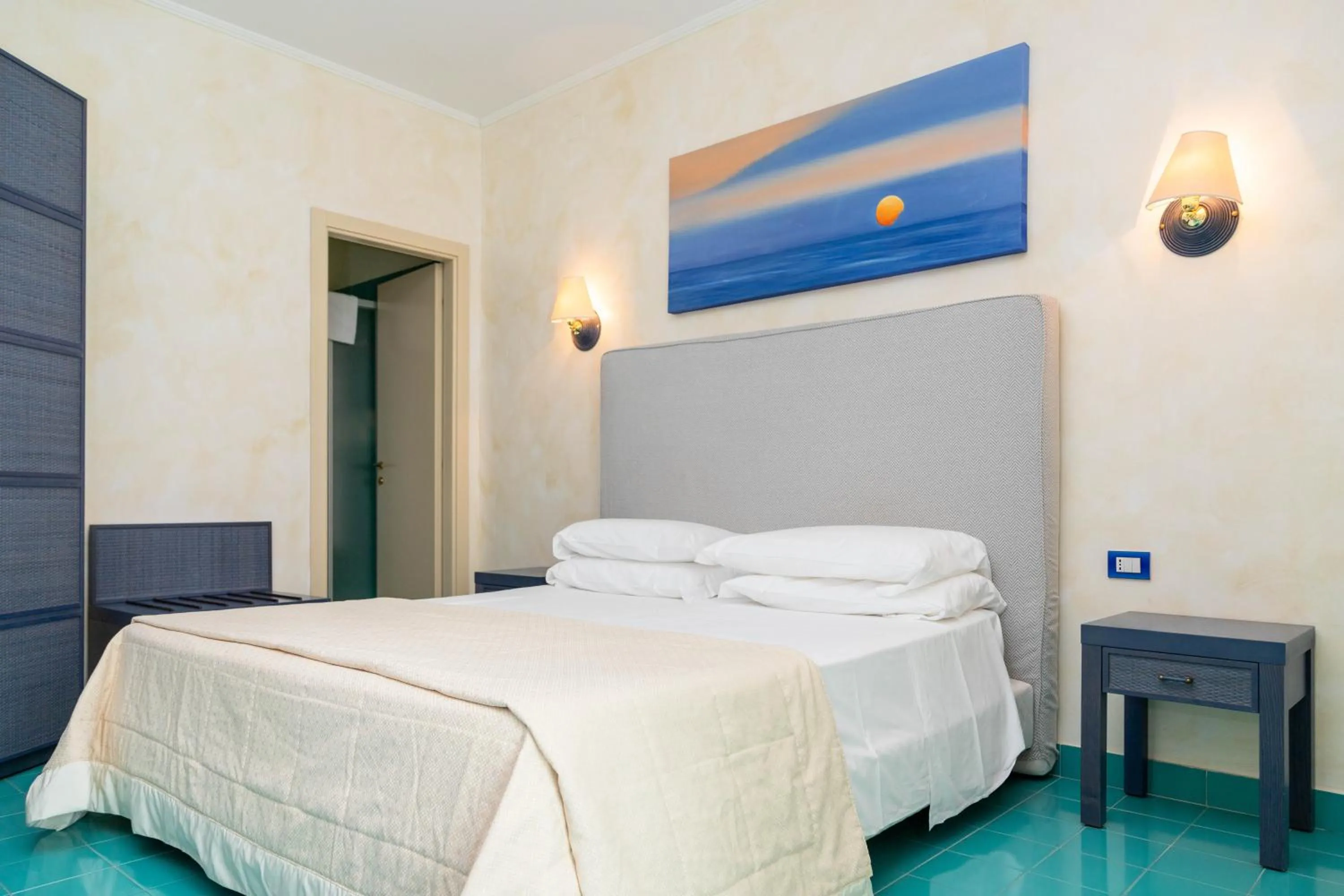 Bed in AH Premium Baia dei Faraglioni